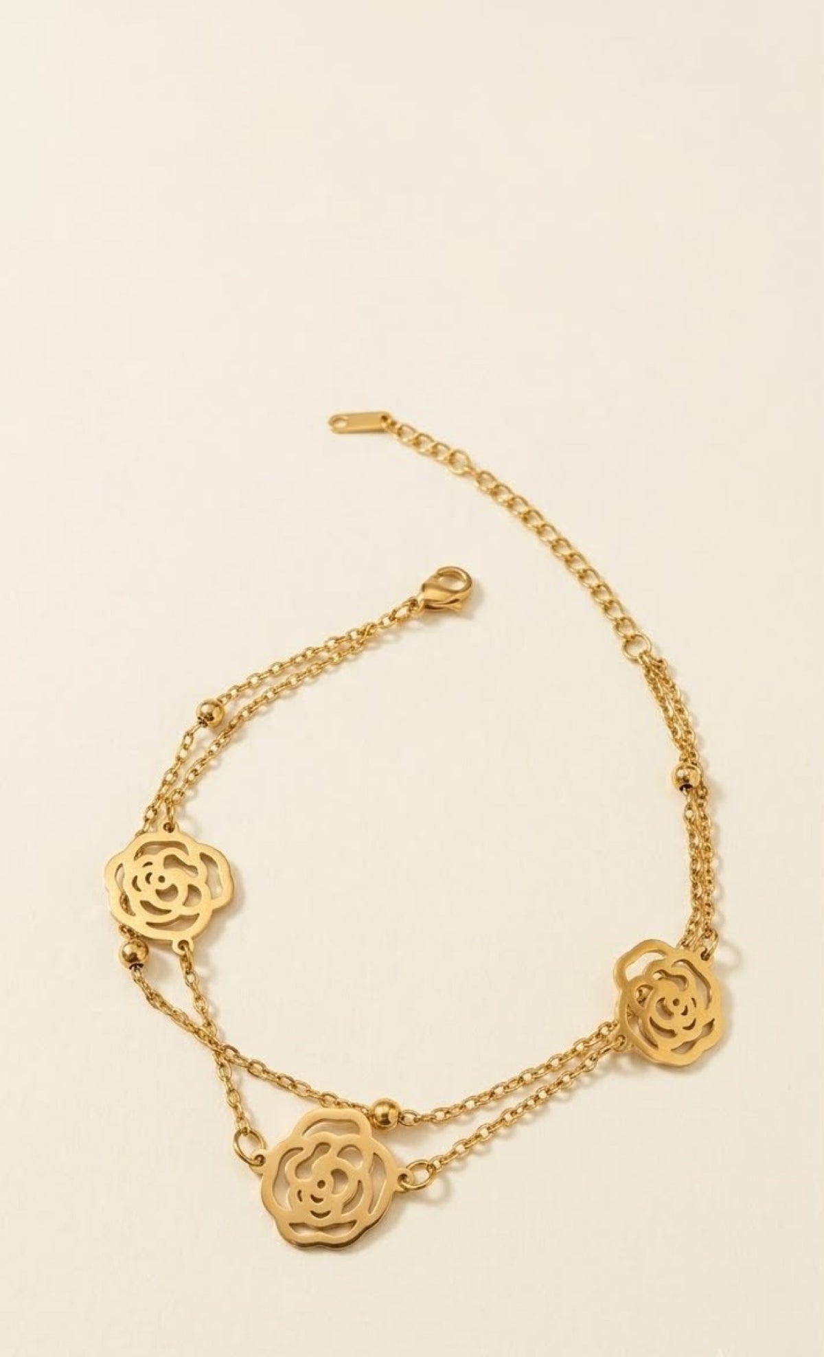 Double-strand gold-tone anklet with openwork rose medallions - view 2