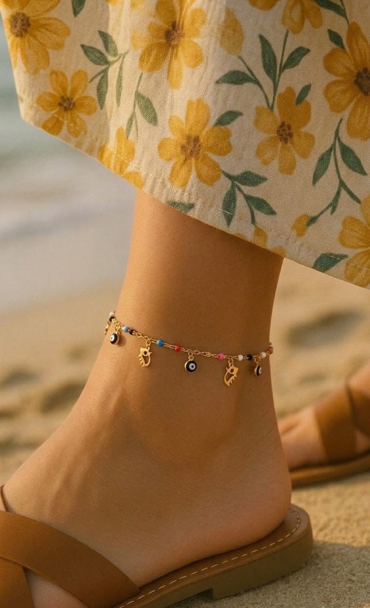 Gold-tone anklet with multicolour enamel beads, evil eye and lashed-eye charms