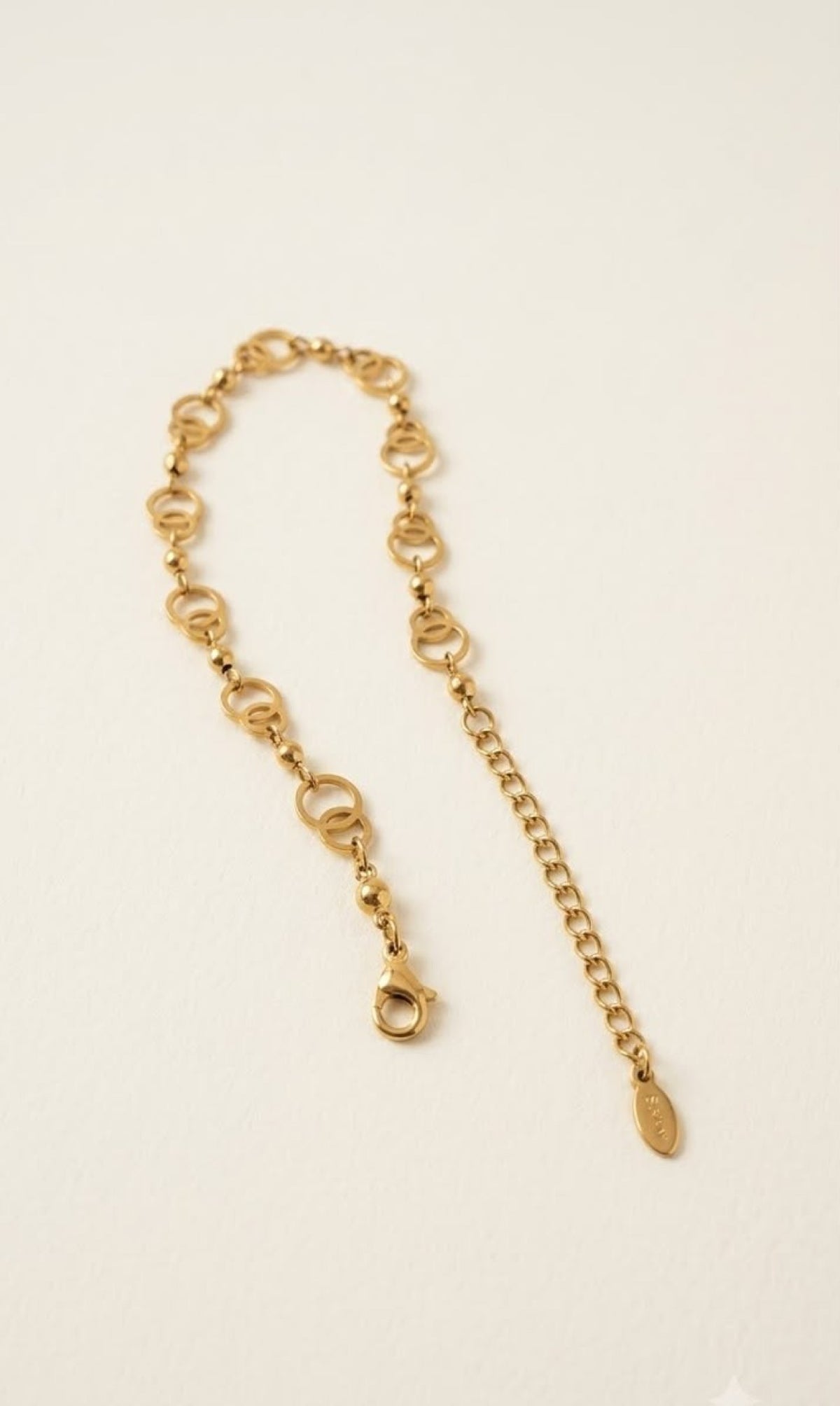 Gold-tone anklet with interlocking ring links and beads - view 3