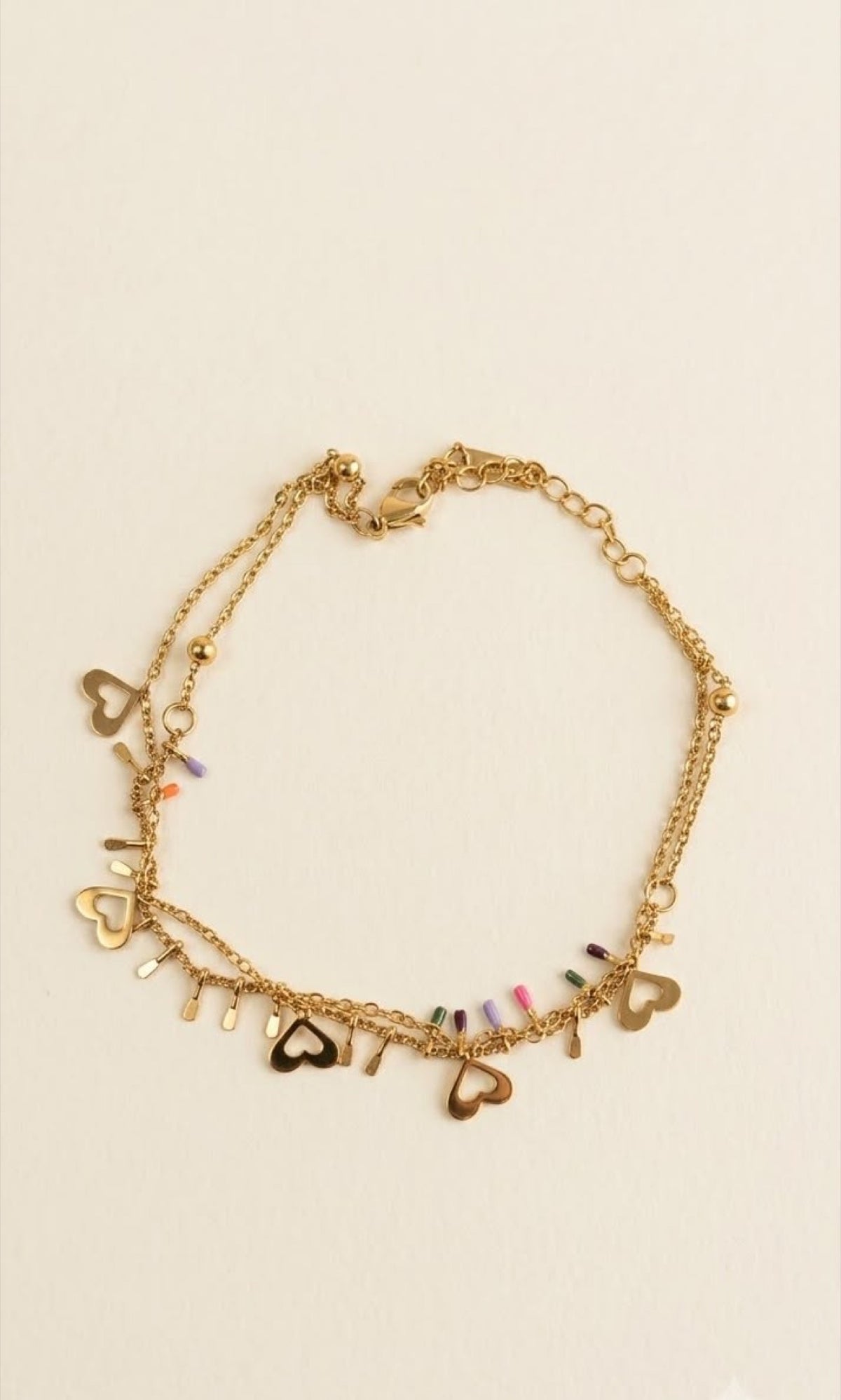 Double-layer gold-tone anklet with open heart charms and multicolour enamel bar drops - view 2