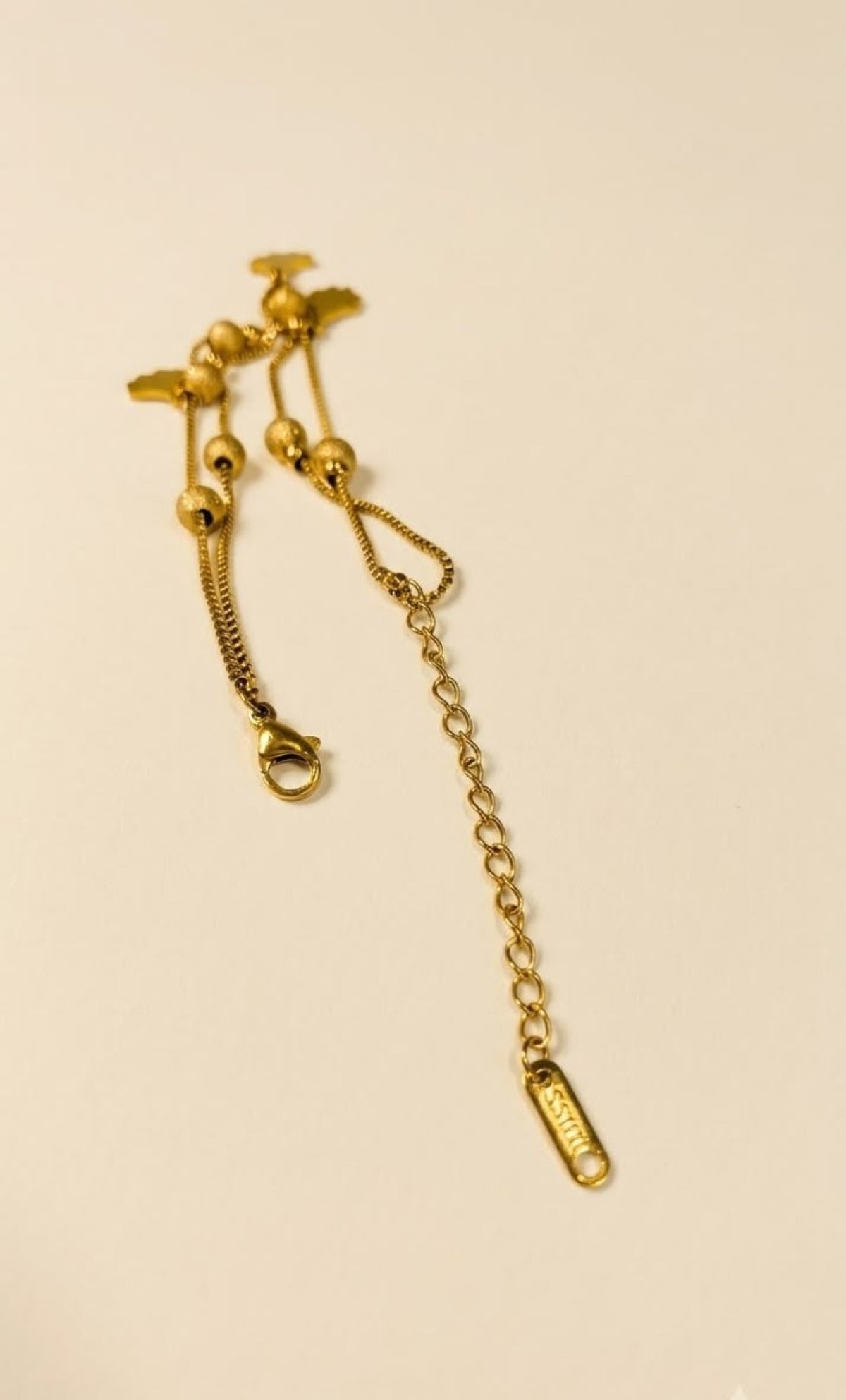 Double box-chain gold-tone anklet with frosted beads and white ginkgo leaf charms - view 3