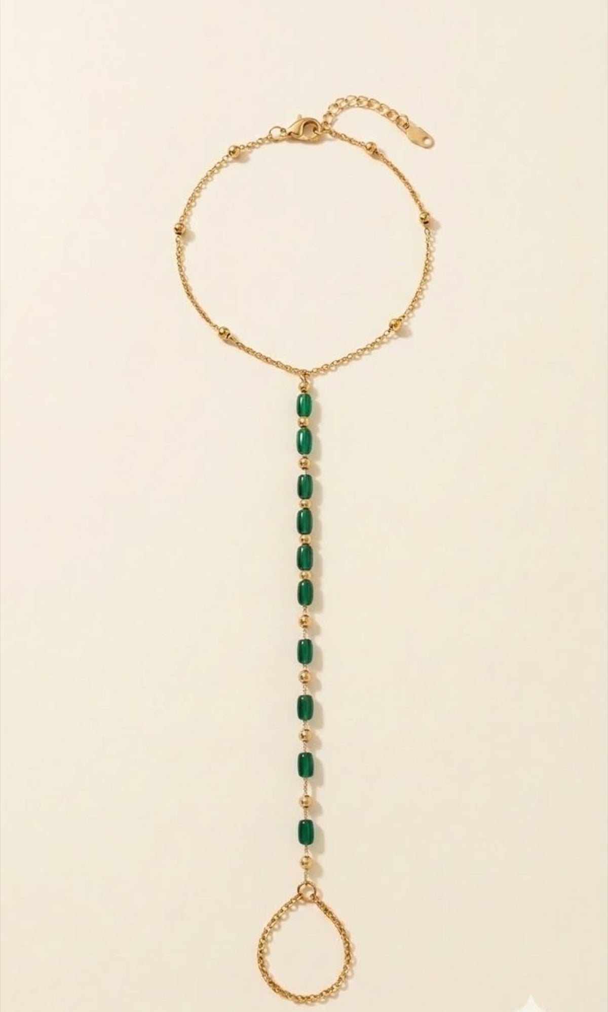 Pair of gold-tone barefoot anklets with green bead drop and toe loop - view 2