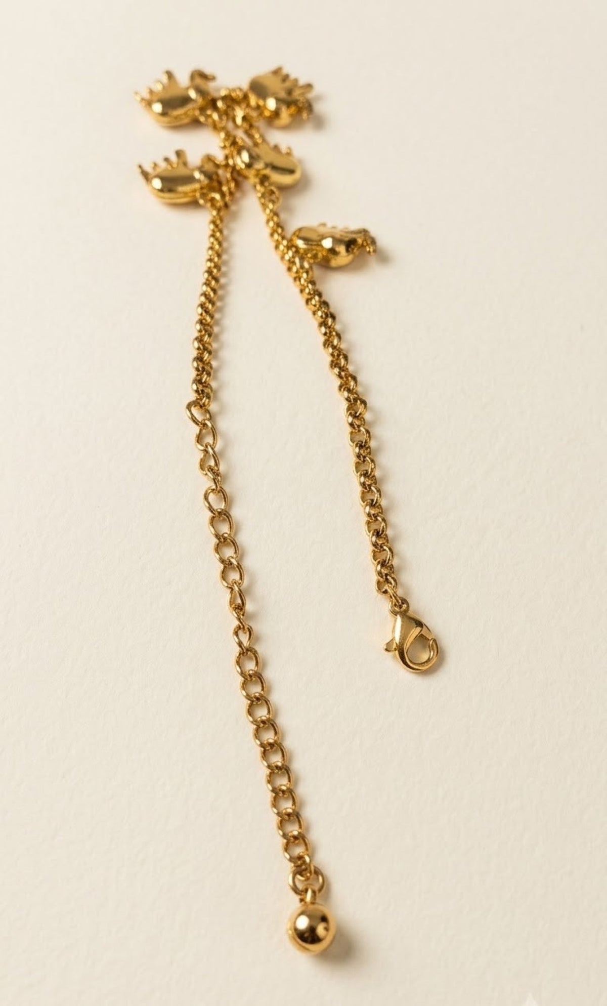 Pair of gold-tone anklets with dangling elephant charms - view 3