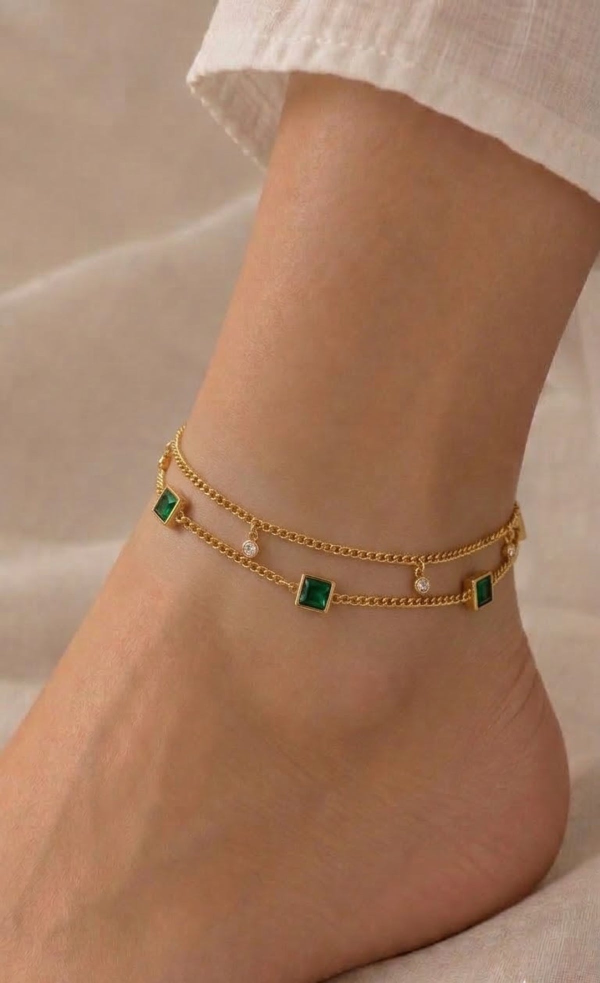 Gold-tone double-chain anklet with square green stones and crystals
