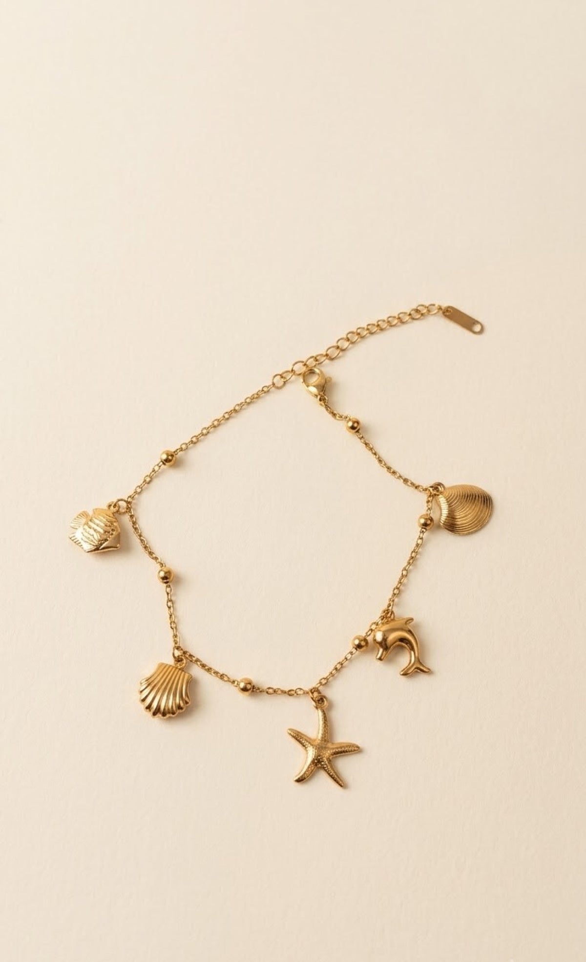 Gold-tone anklet with seashell, starfish and dolphin charms - view 2