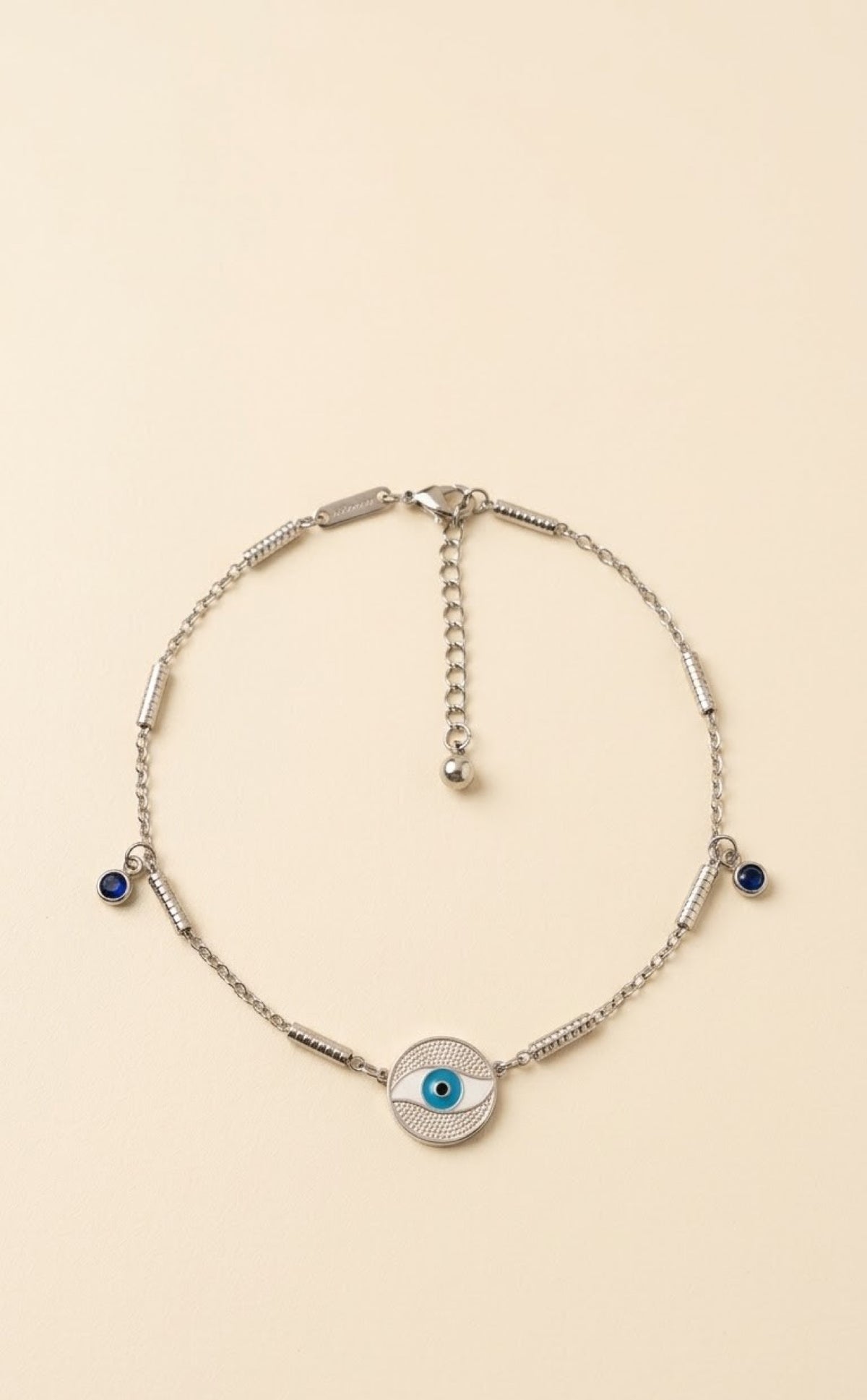 Pair of silver-tone anklets with blue evil eye disc and blue stone drops - view 2