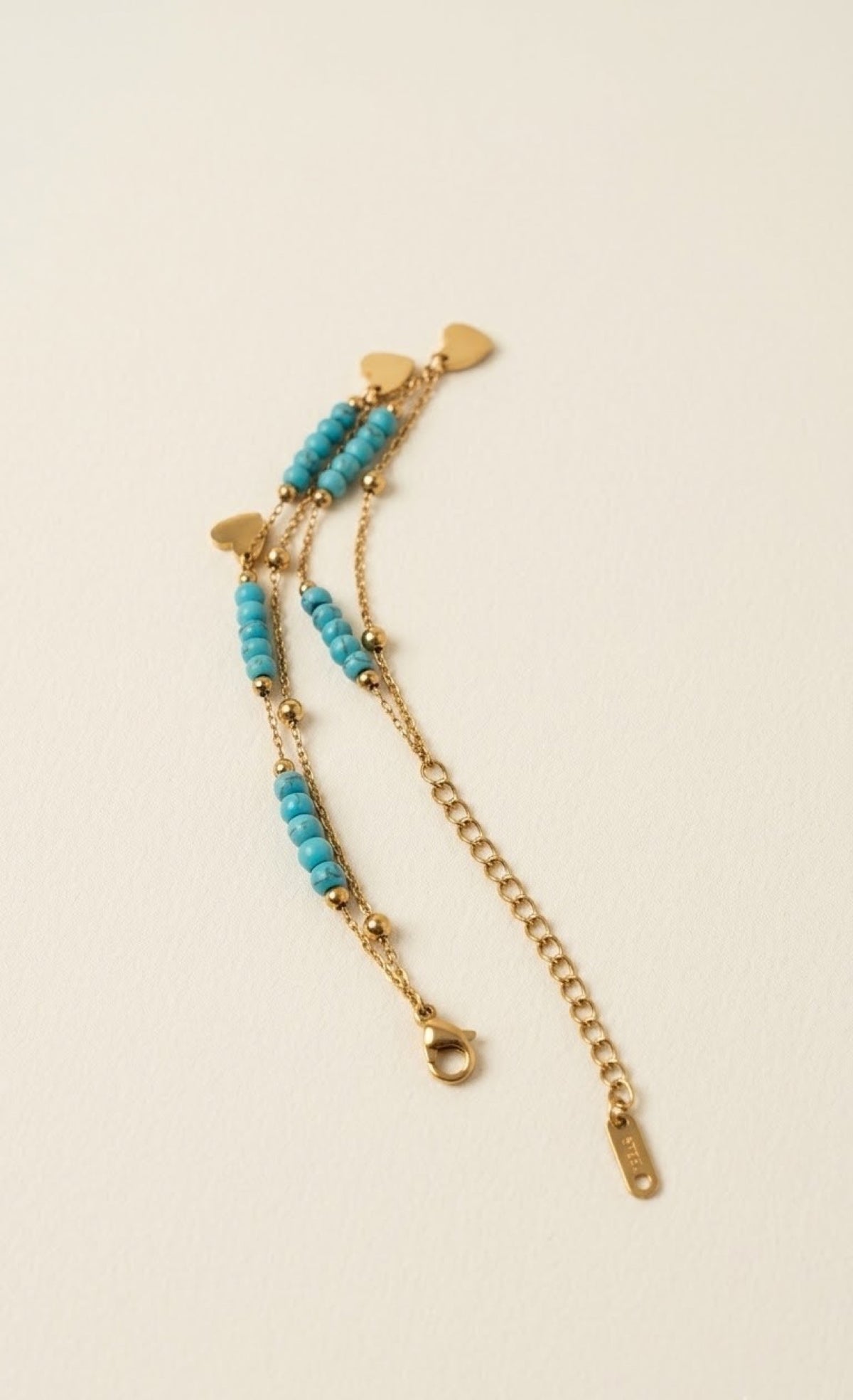 Gold-tone double-chain anklet with turquoise beads and white heart charms - view 3