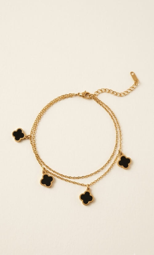 Gold-tone double-chain anklet with black four-leaf clover charms - view 2