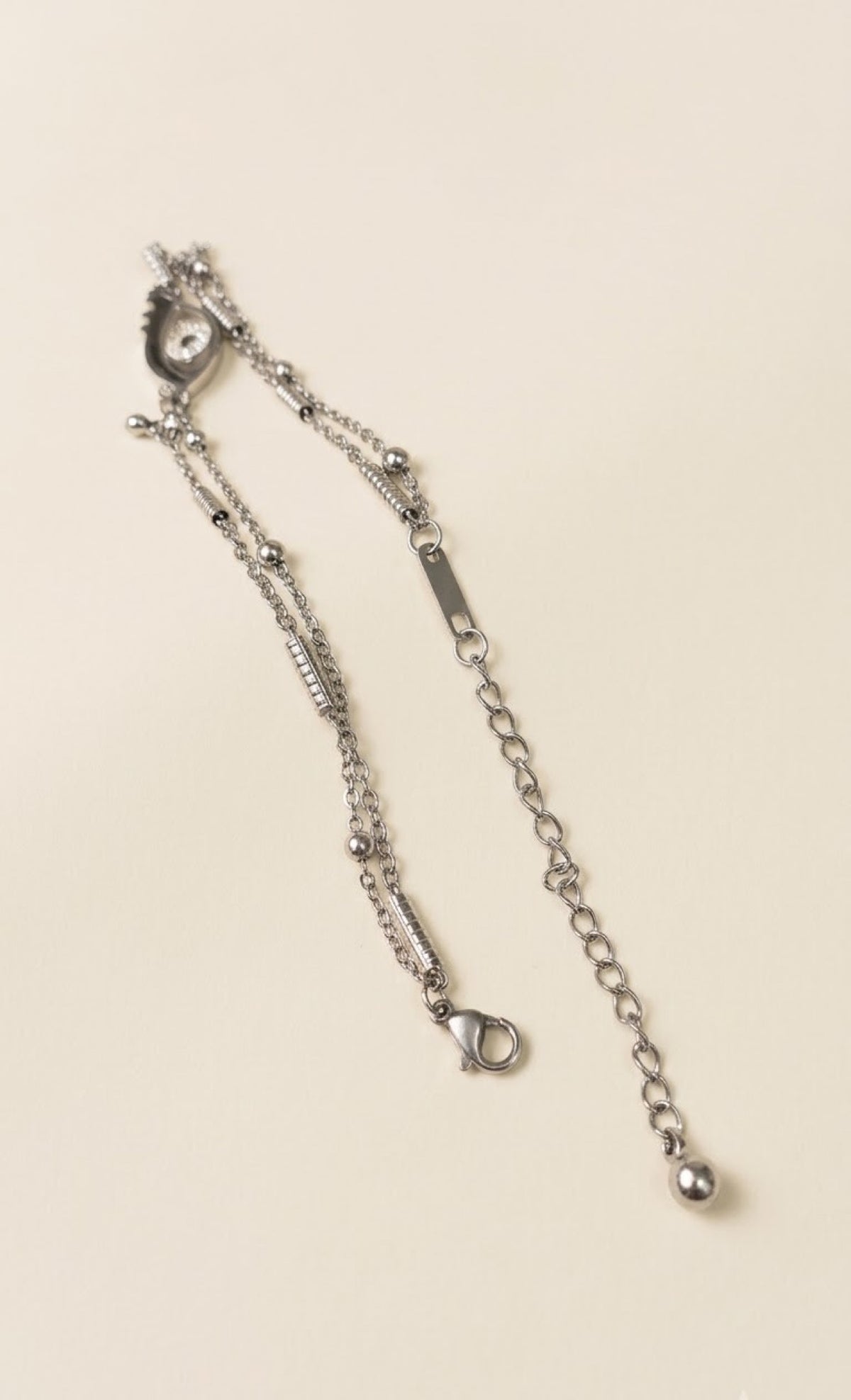 Silver-tone layered anklet with black enamel crystal eye charm and blue stone - view 3