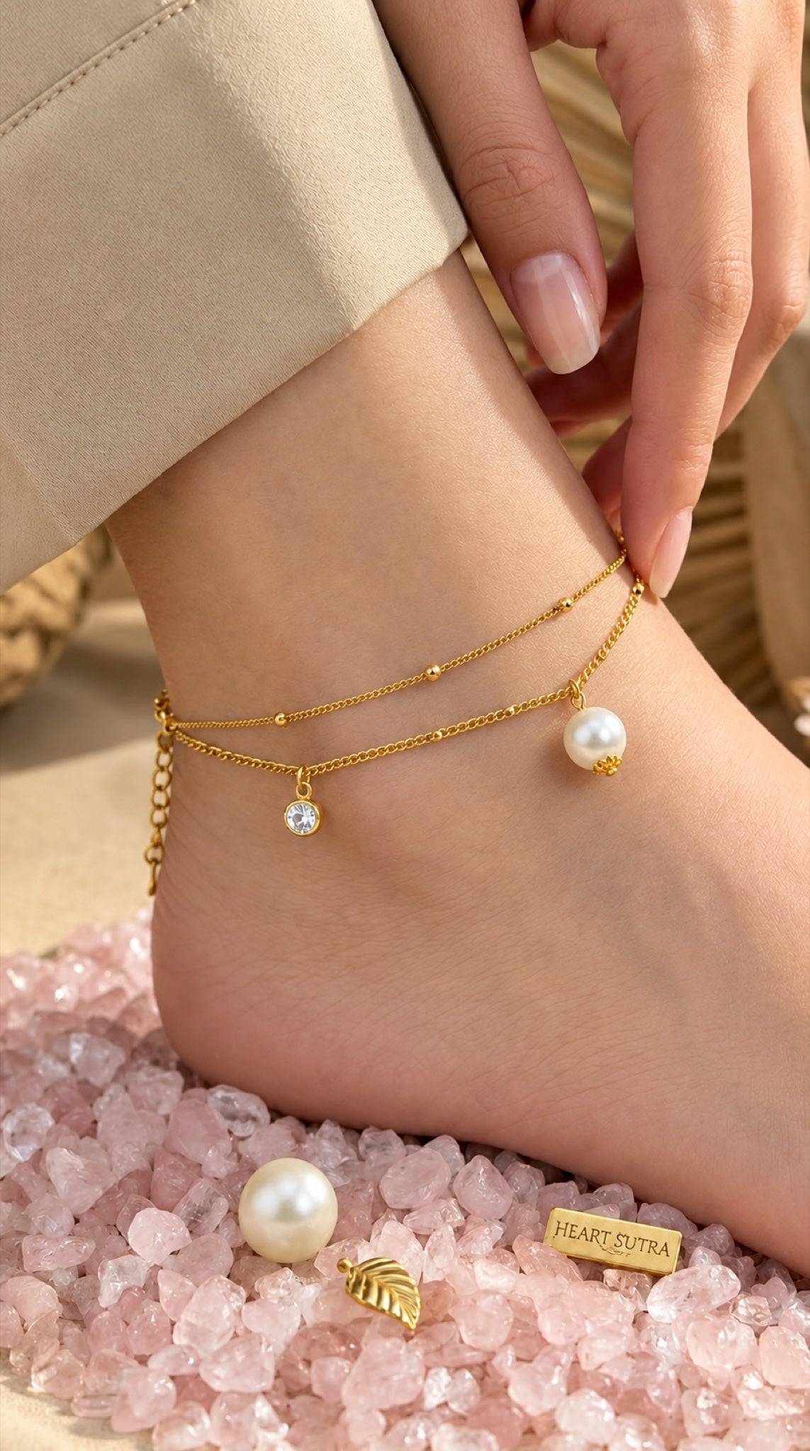 Gold-tone layered anklet with faux pearl drop and crystal charm