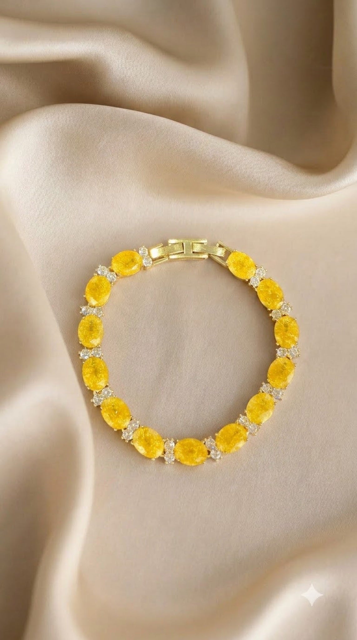Gold-tone tennis bracelet with yellow oval stones - view 2