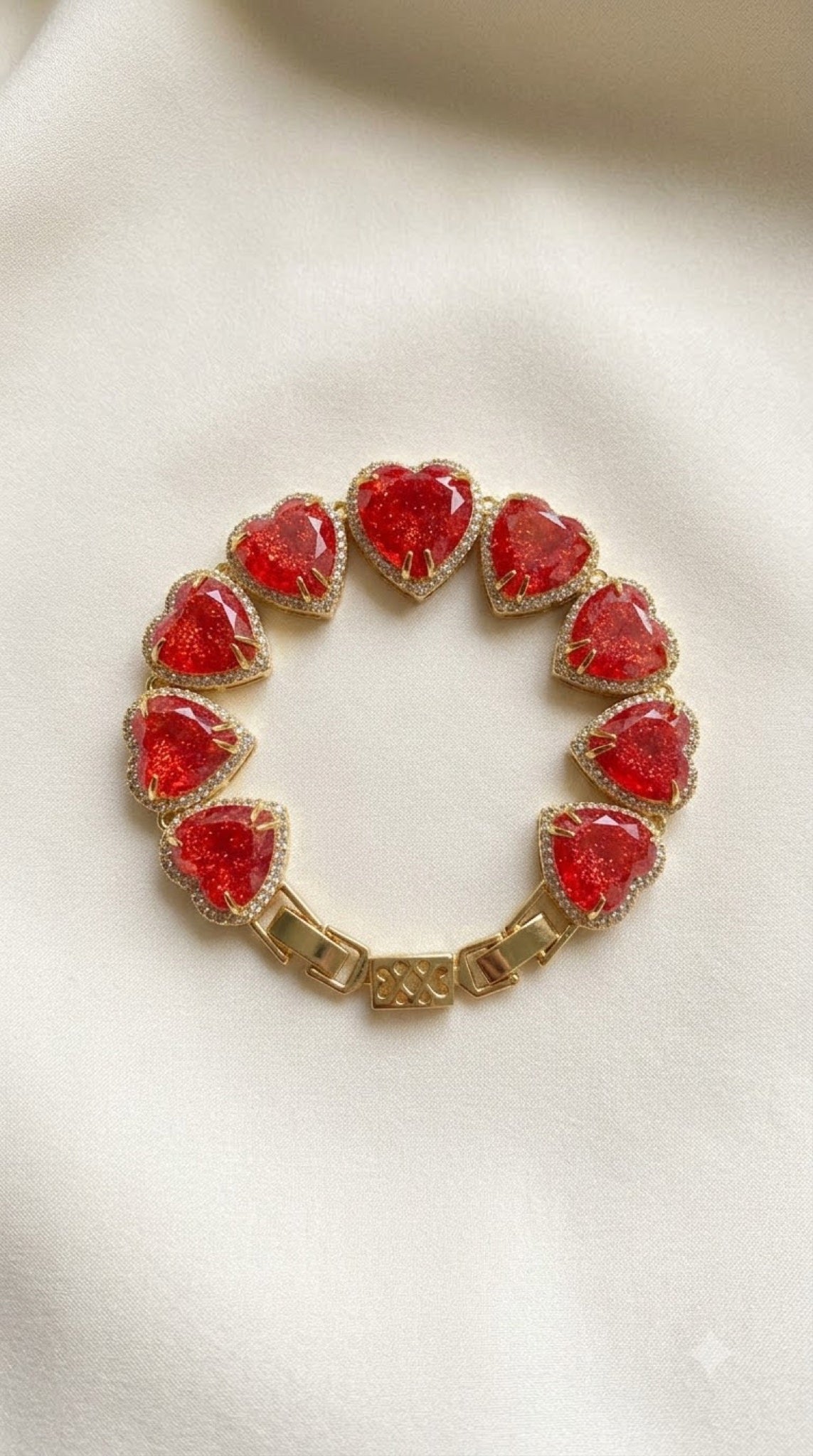 Gold-tone bracelet of red heart stones with crystal halos - view 2