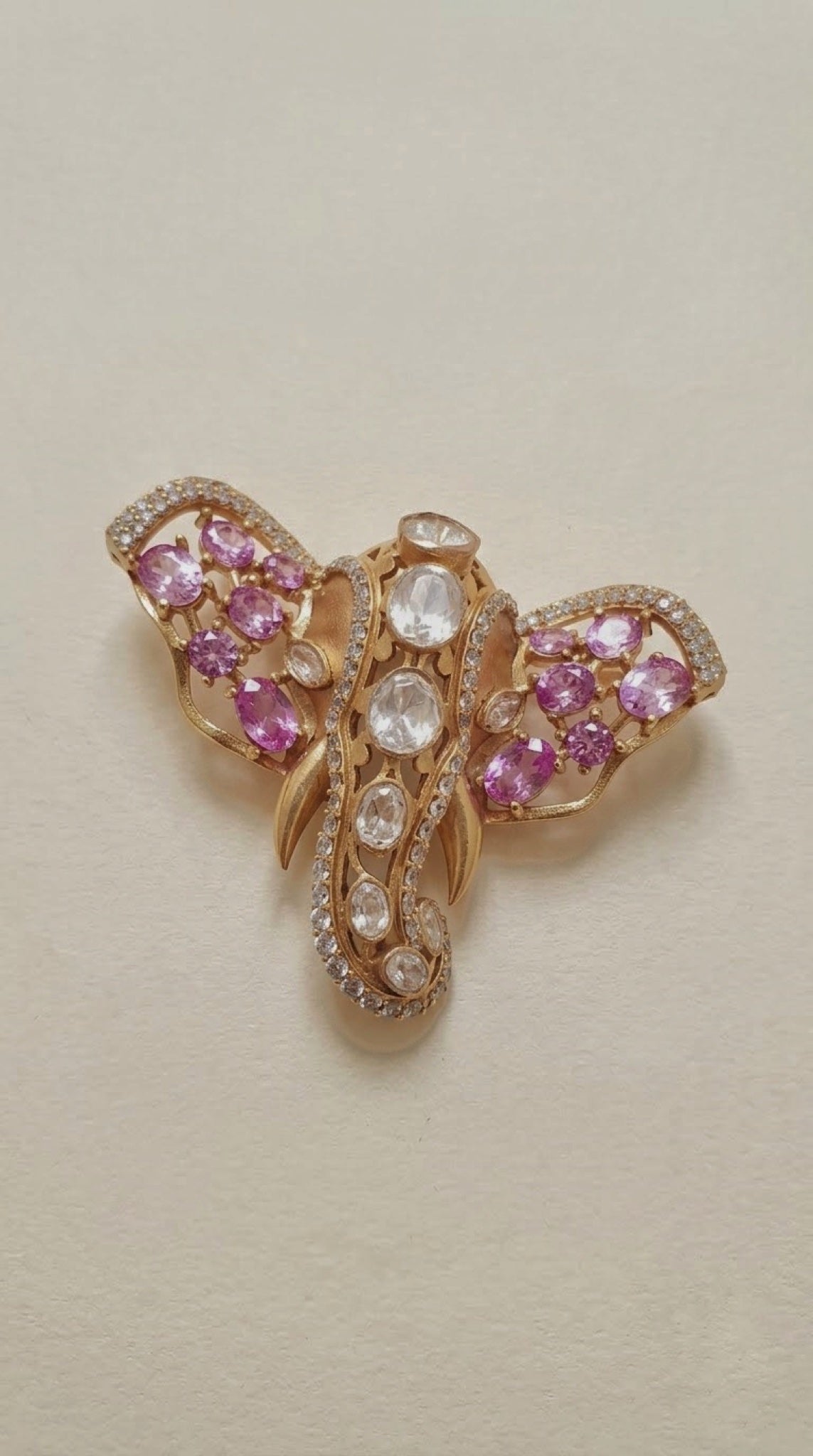 Gold-tone elephant head brooch with pink stones and polki-look centre - view 3