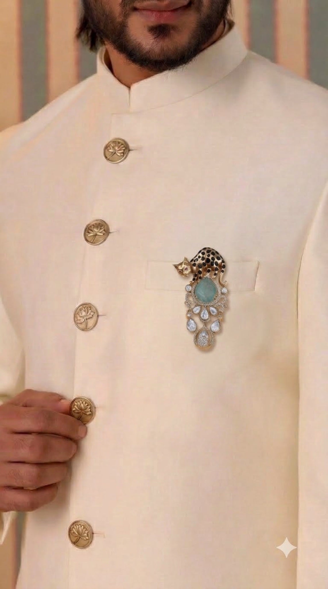 Gold-tone leopard brooch with aqua stone and polki-look stones