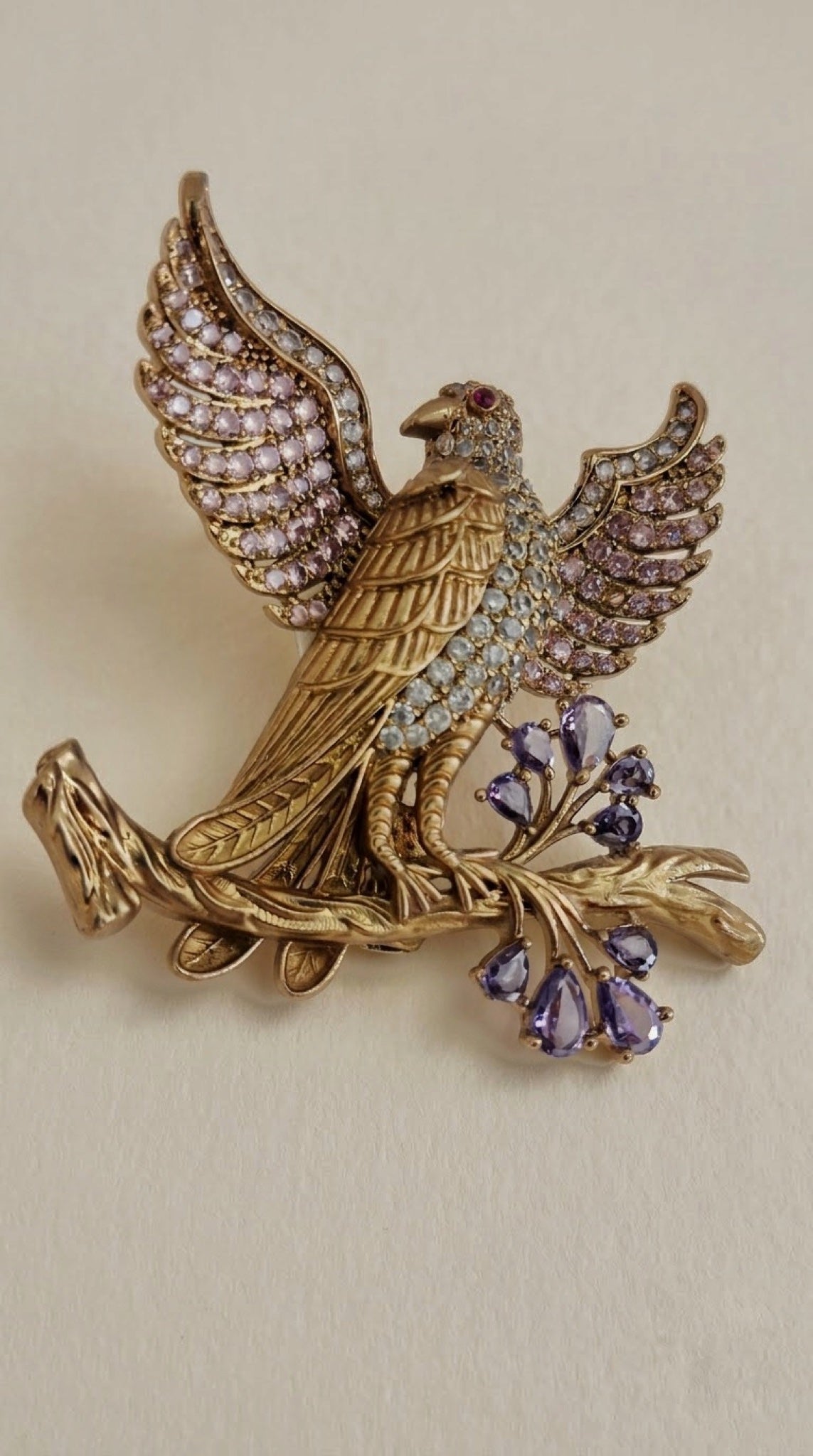 Gold-tone eagle brooch with crystal wings on a branch with lilac stones - view 3