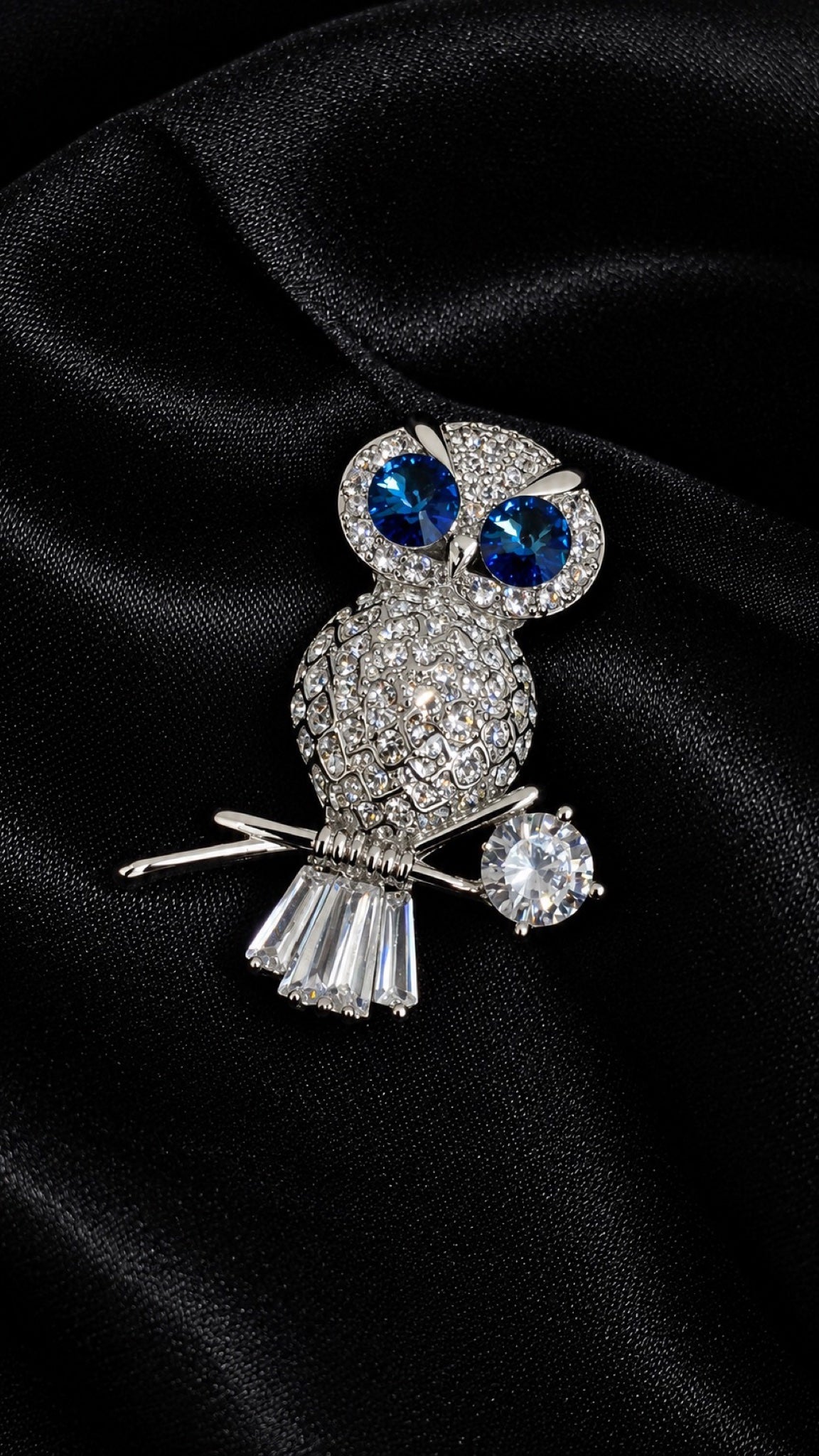 Silver-tone owl brooch with blue crystal eyes perched on a branch - view 3