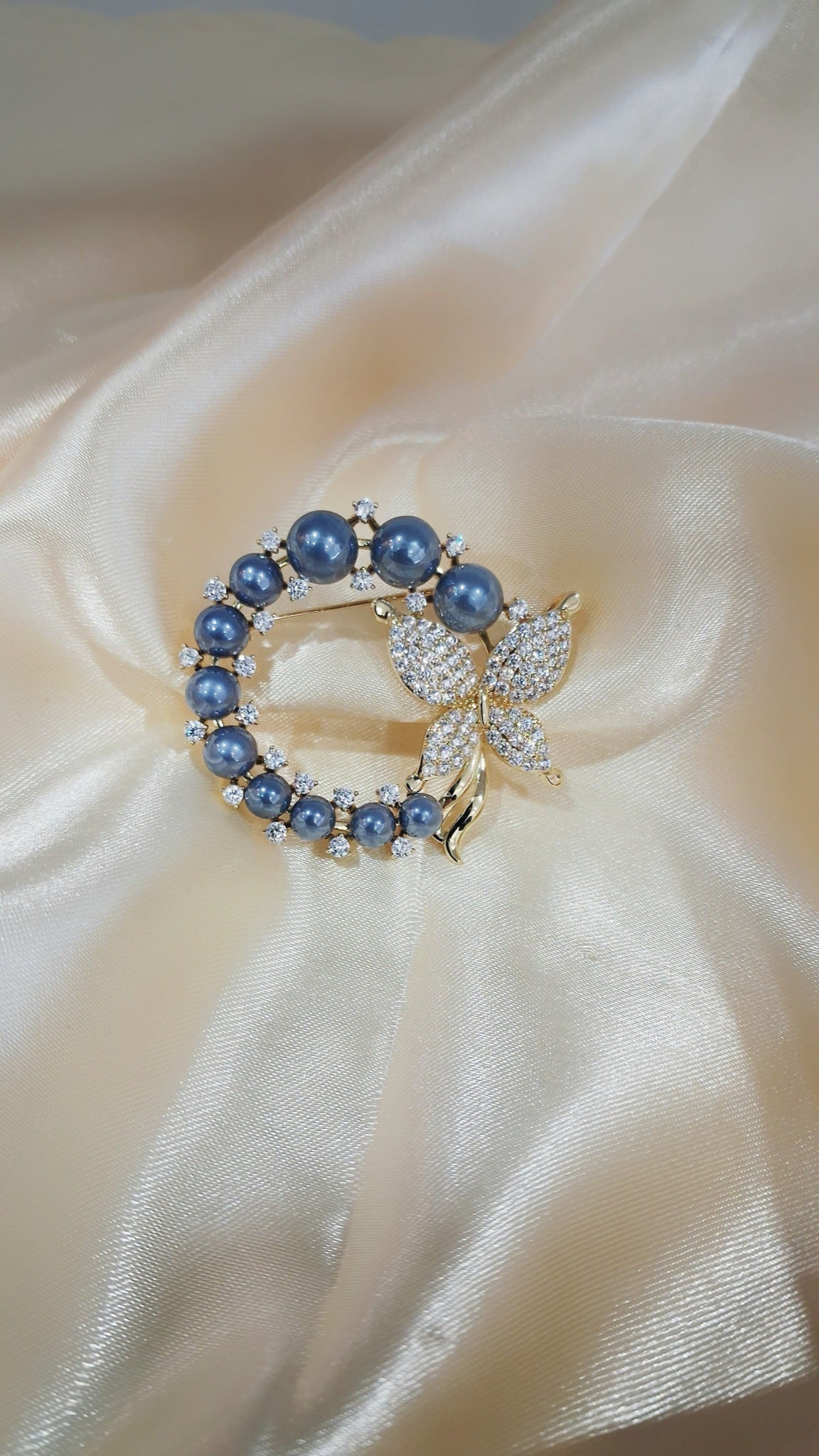 Gold-tone wreath brooch with blue faux pearls and crystal butterfly - view 2