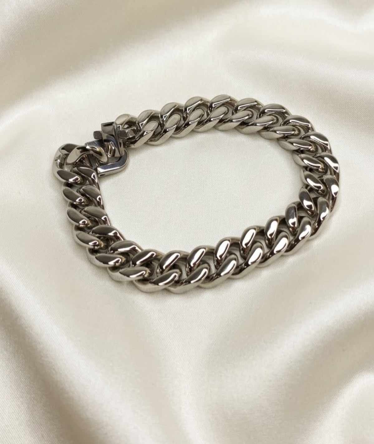 Miami Cuban box clasp bracelet in silver-tone and black-finish on white satin - view 2
