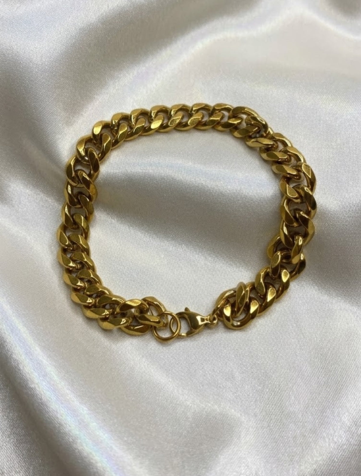 Everyday curb link bracelet in gold-tone and silver-tone on white satin - view 2