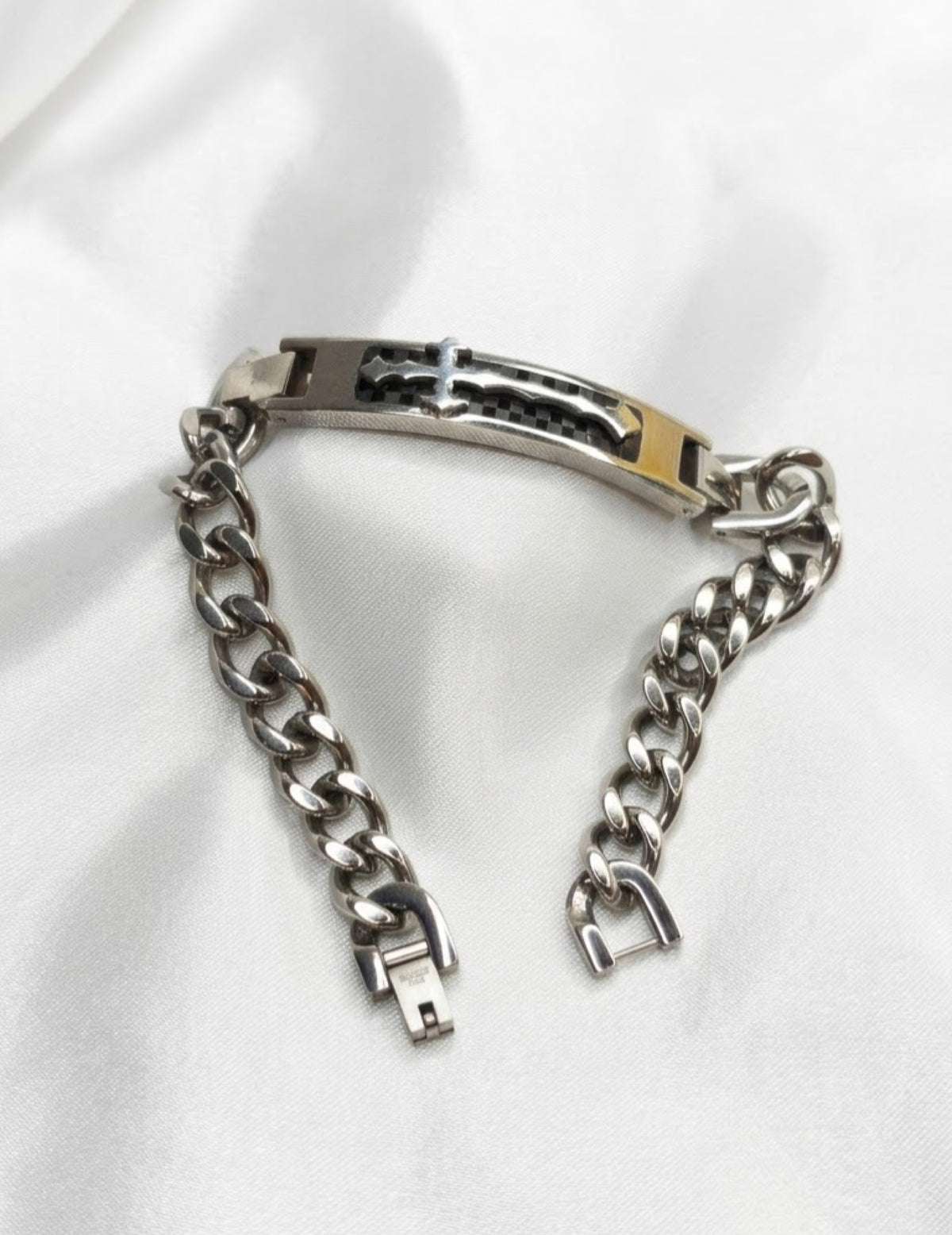 Silver-tone curb link ID bracelet with cut-out cross over black-finish inlay