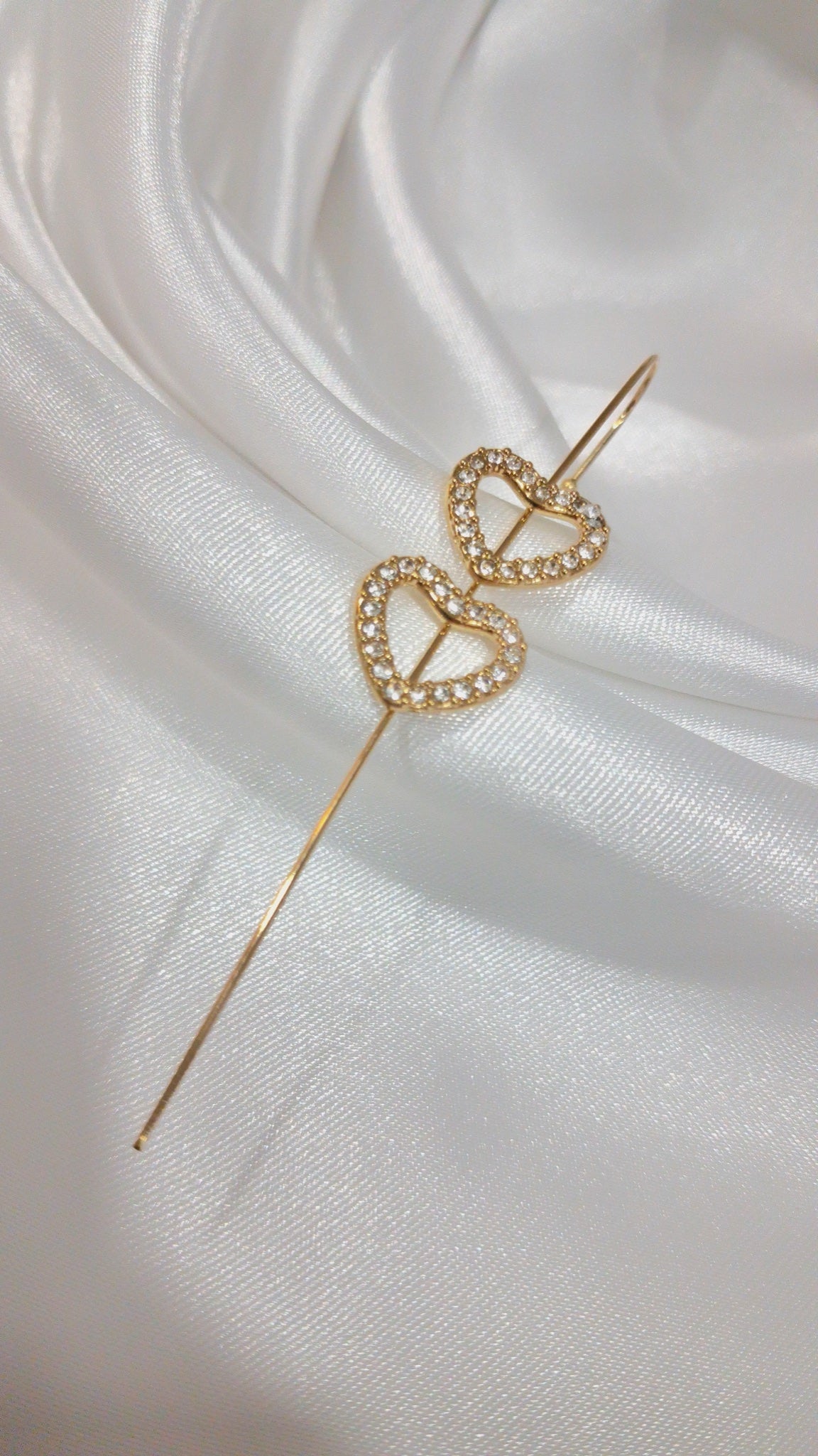 Gold-tone ear pin cuff with two crystal-paved open hearts