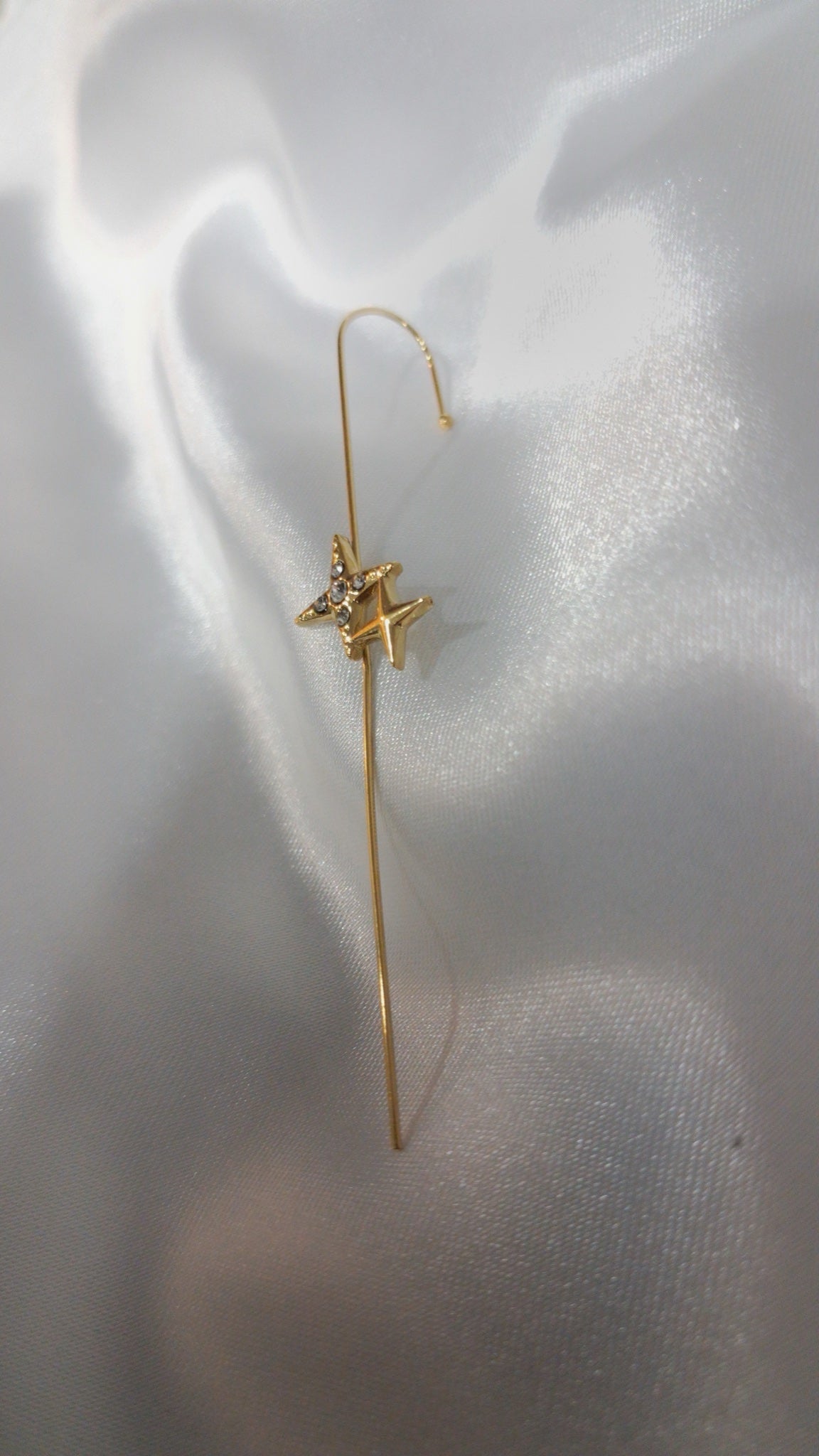 Gold-tone ear pin cuff with two four-point stars and crystals - view 2