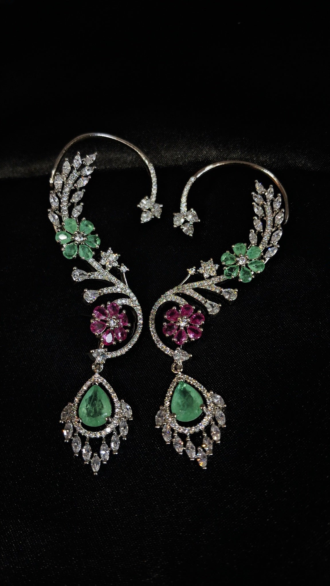 Pair of silver-tone full ear cuffs with green and pink stone flowers and teardrop drops
