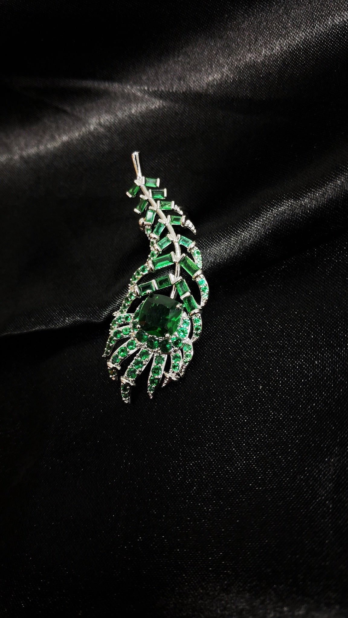 Pair of silver-tone peacock feather ear cuffs with emerald-green stones - view 2