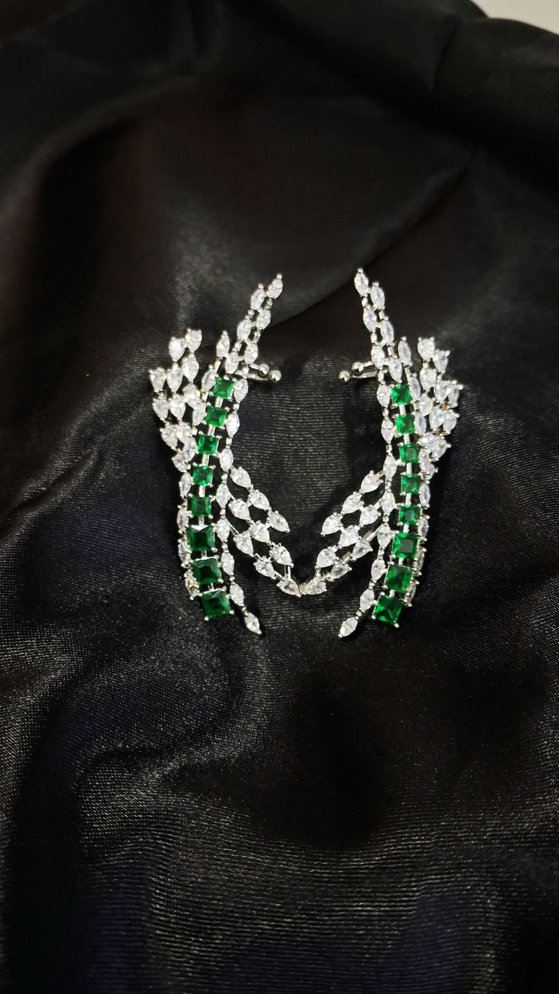 Silver-tone crystal spray ear climbers with green square stones