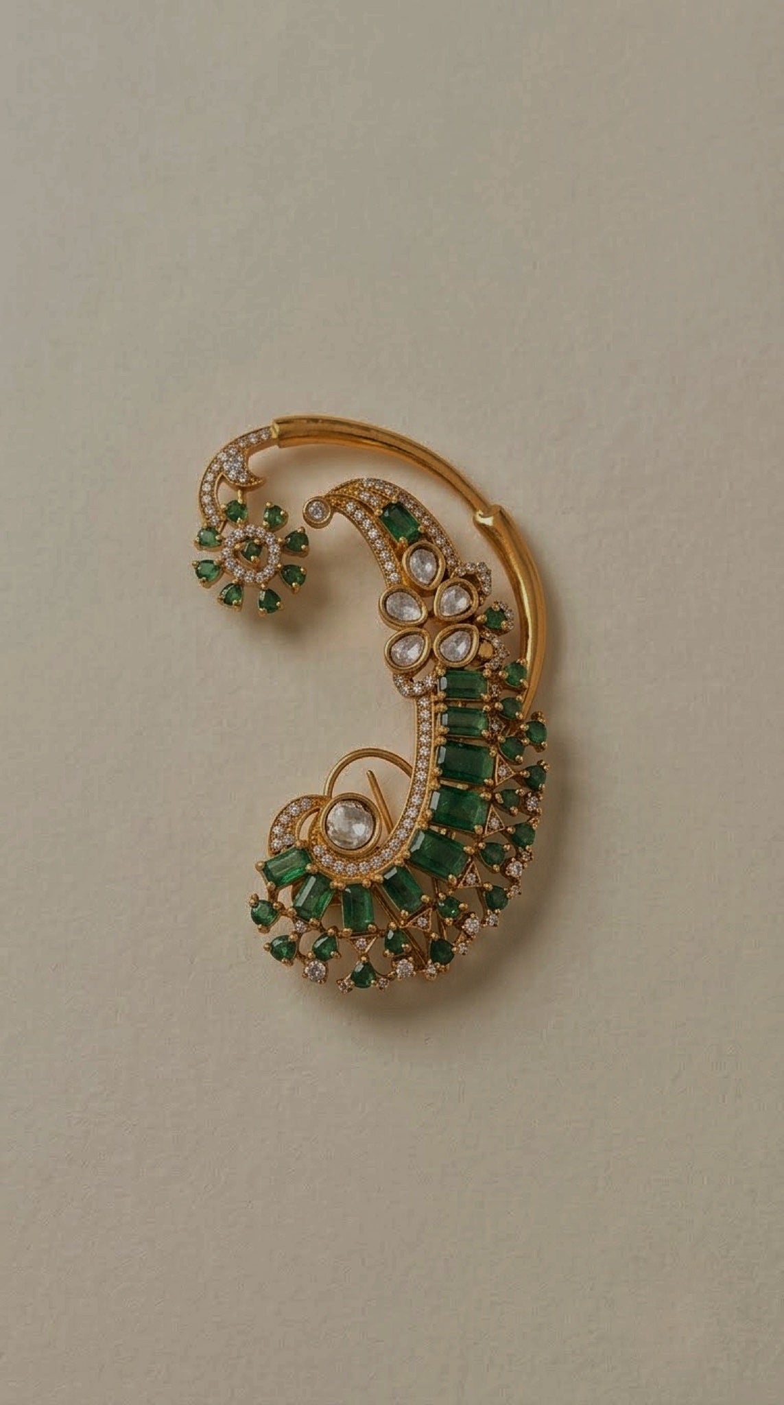 Gold-tone full-ear cuffs with green baguette stones and kundan-look petals - view 2