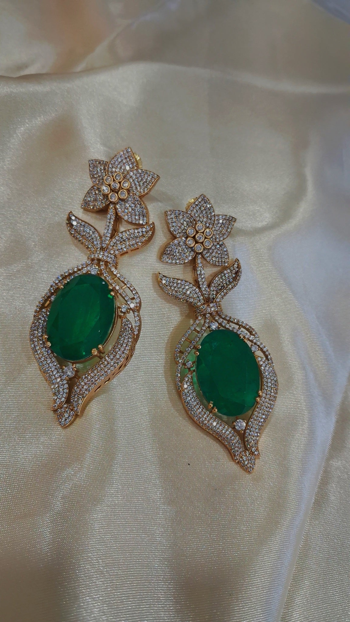 Gold-tone drop earrings with oval green stone and crystal star-flower top - view 3