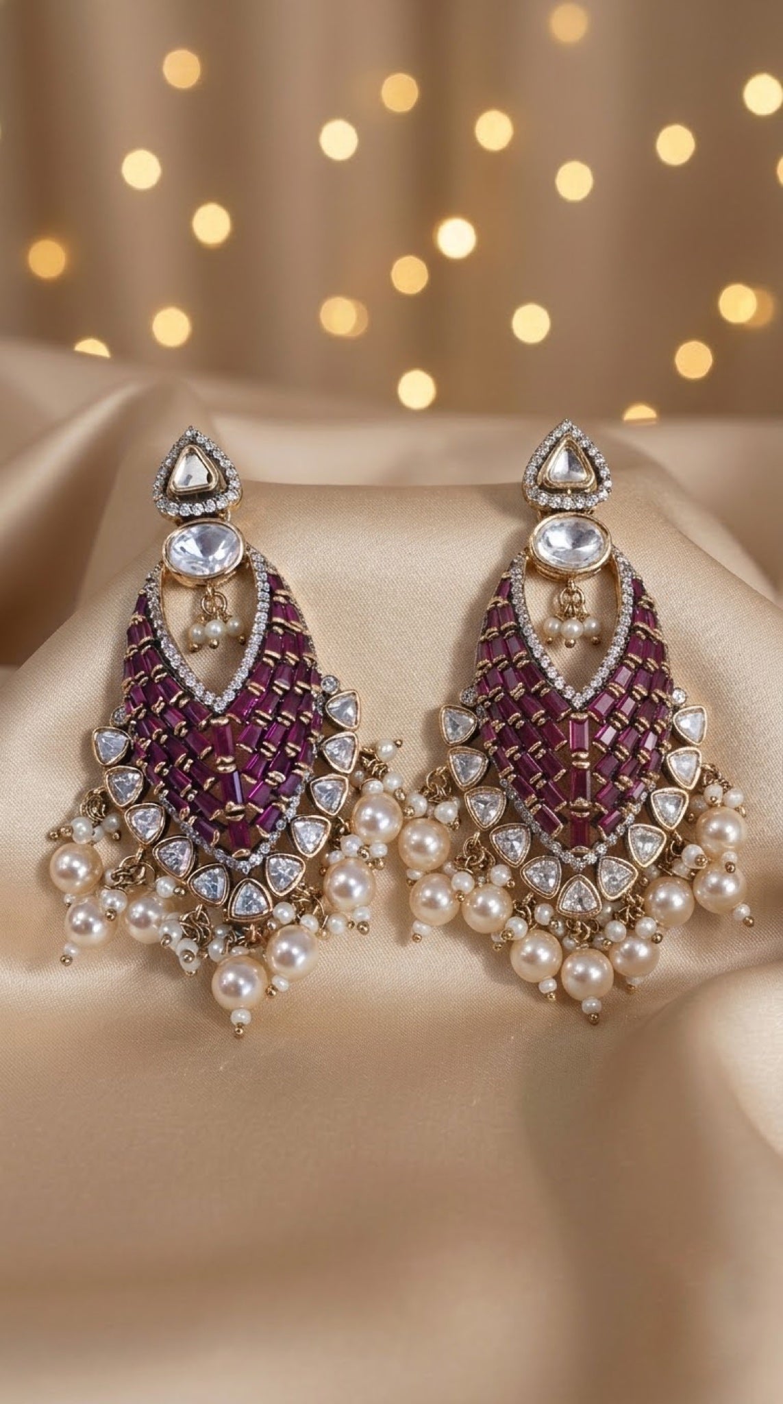 Kundan chandbali earrings with ruby-red baguette stones and faux pearl fringe