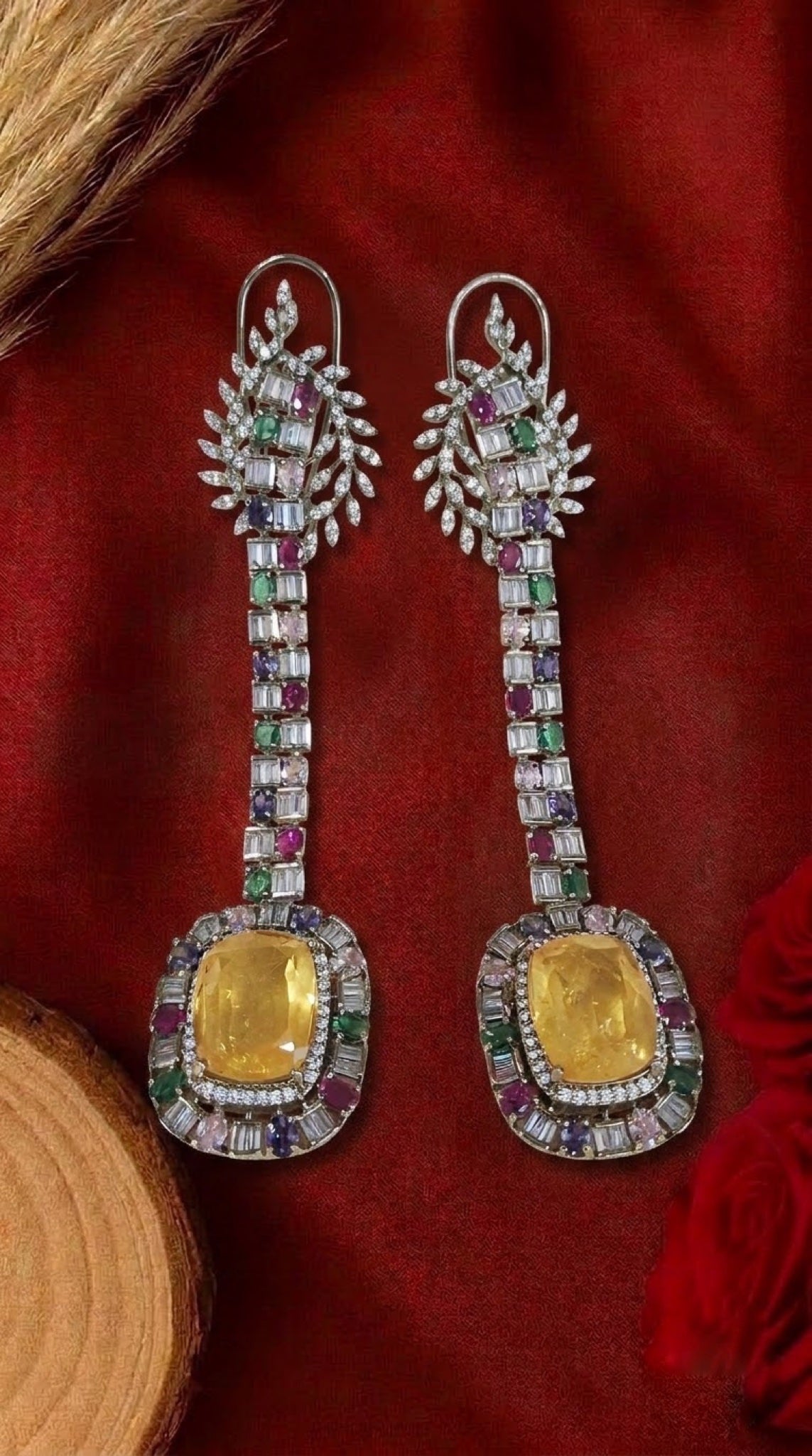 Long linear earrings with canary-yellow stone and multicolour baguettes