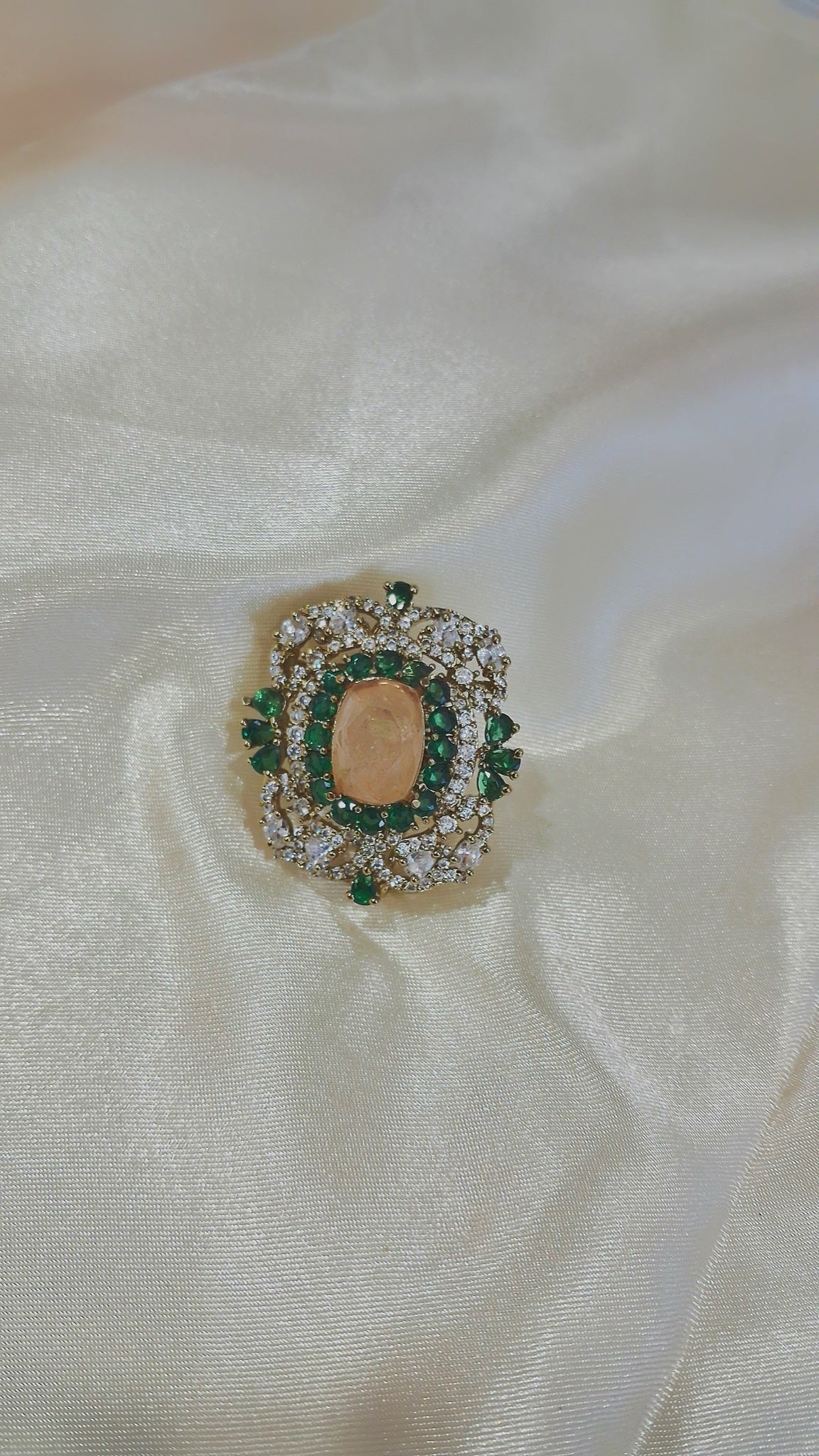 Statement stud earrings with peach cushion stone and green accents - view 2