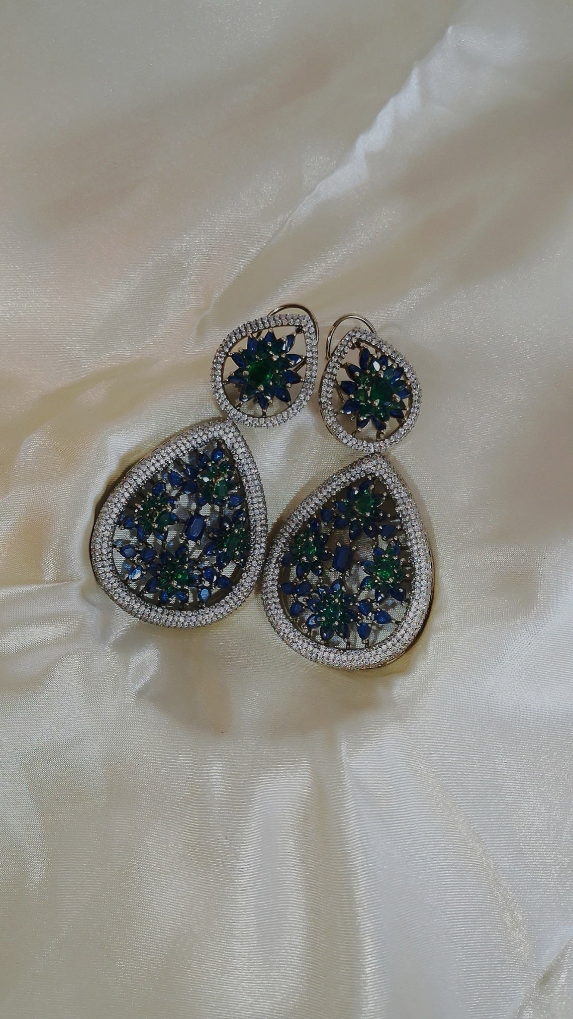 Silver-tone teardrop earrings with blue and green floral stones - view 3