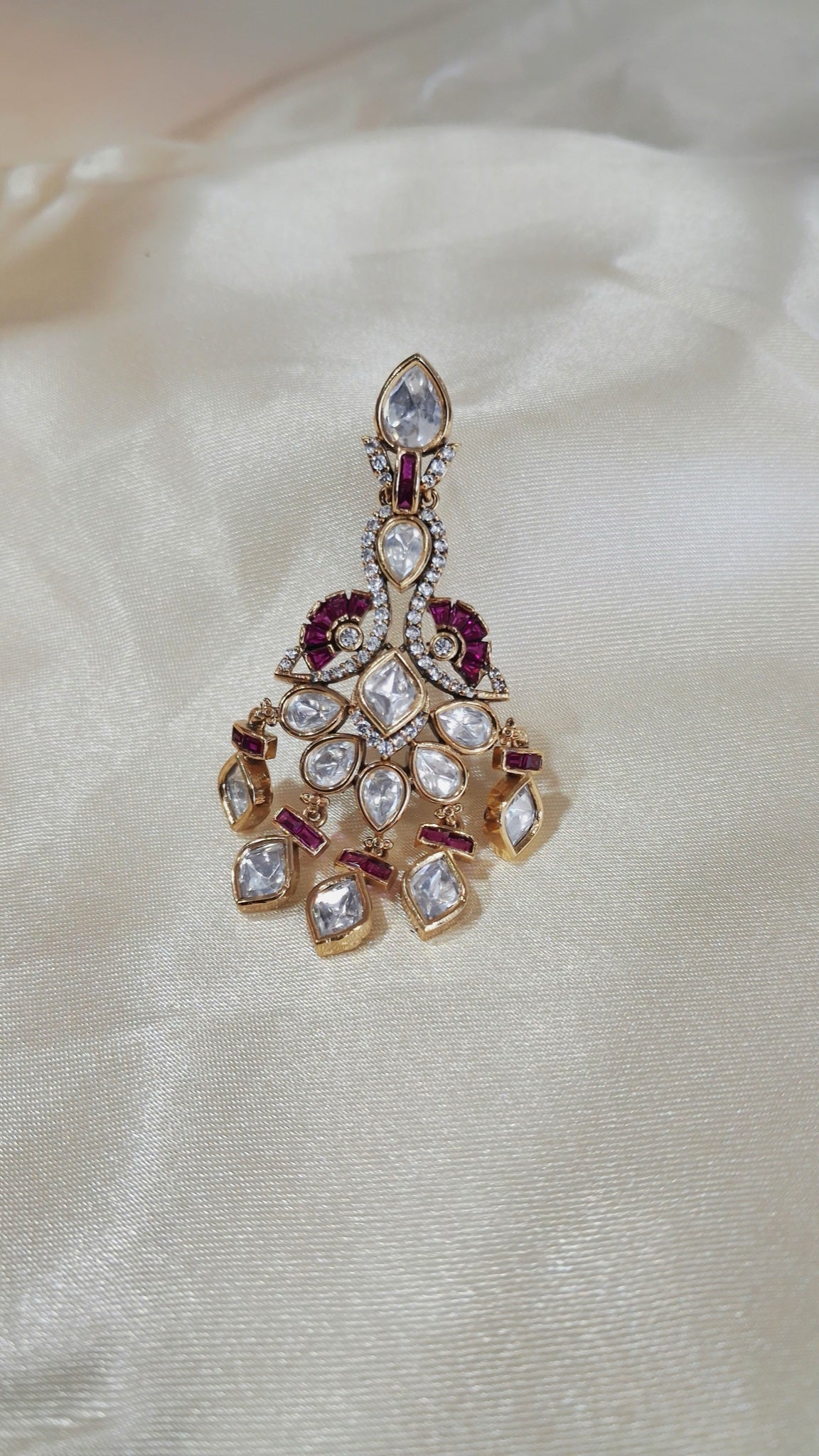 Gold-tone kundan chandelier earrings with ruby-accented peacock motif - view 2