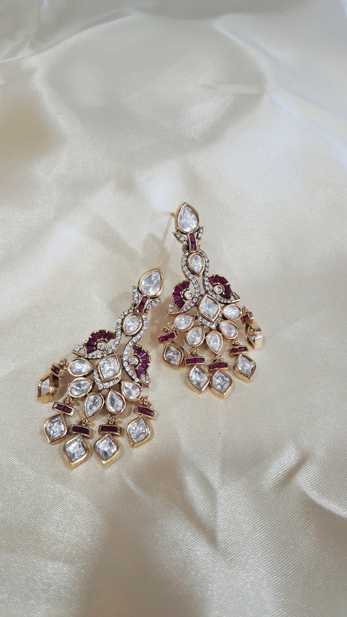 Gold-tone kundan chandelier earrings with ruby-accented peacock motif - view 3