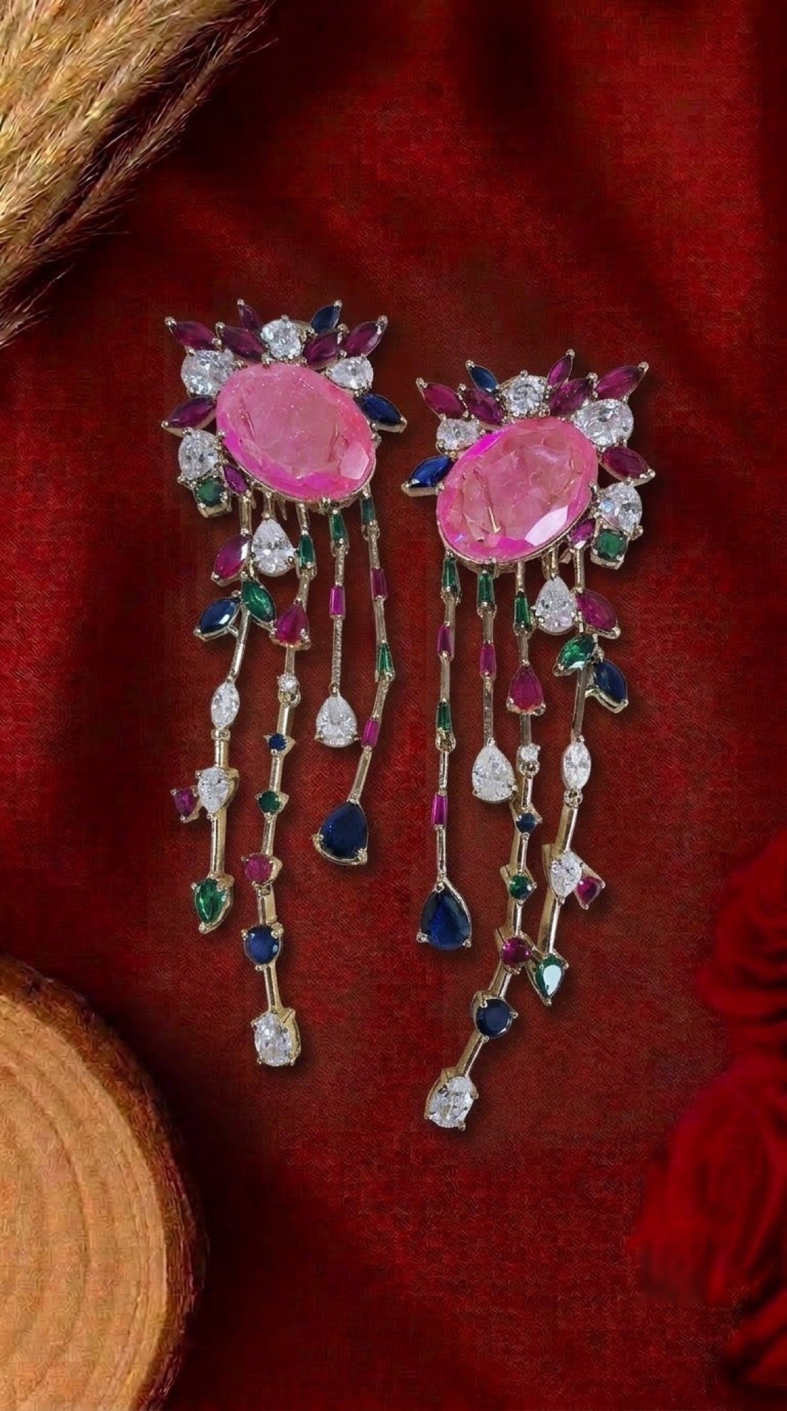 Gold-tone waterfall earrings with pink oval stone and multicolour crystal strands
