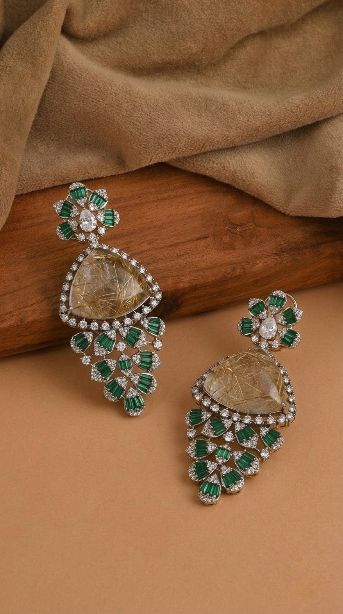 Silver-tone earrings with golden rutile-look stone and green baguette crystals