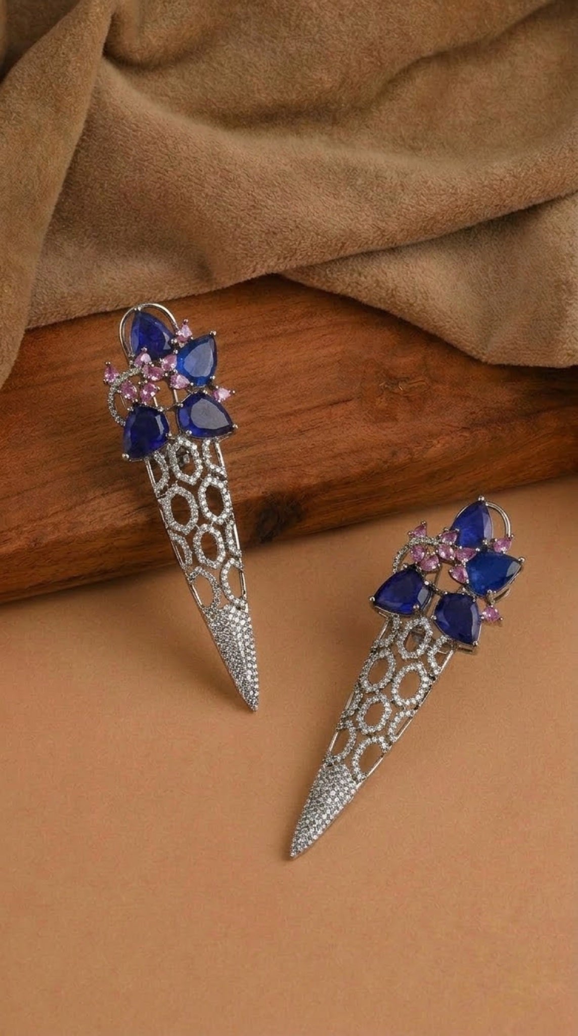 Silver-tone honeycomb spike earrings with blue pear stones and pink accents