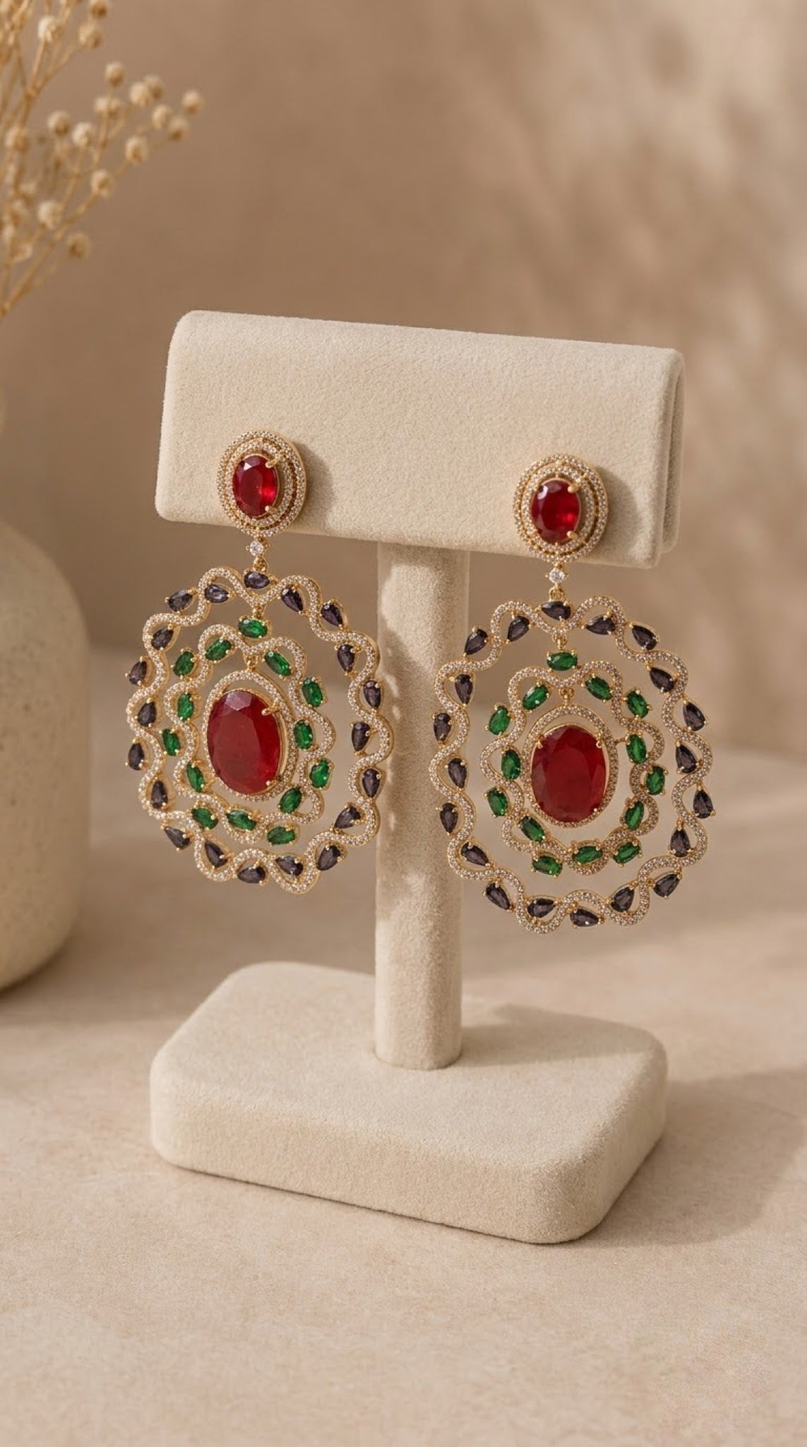 Gold-tone oval halo earrings with red centre stone, green and violet pear crystals