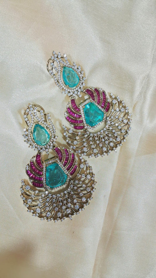 Dual-tone chandbali earrings with aqua stones, pink baguettes and CZ fan