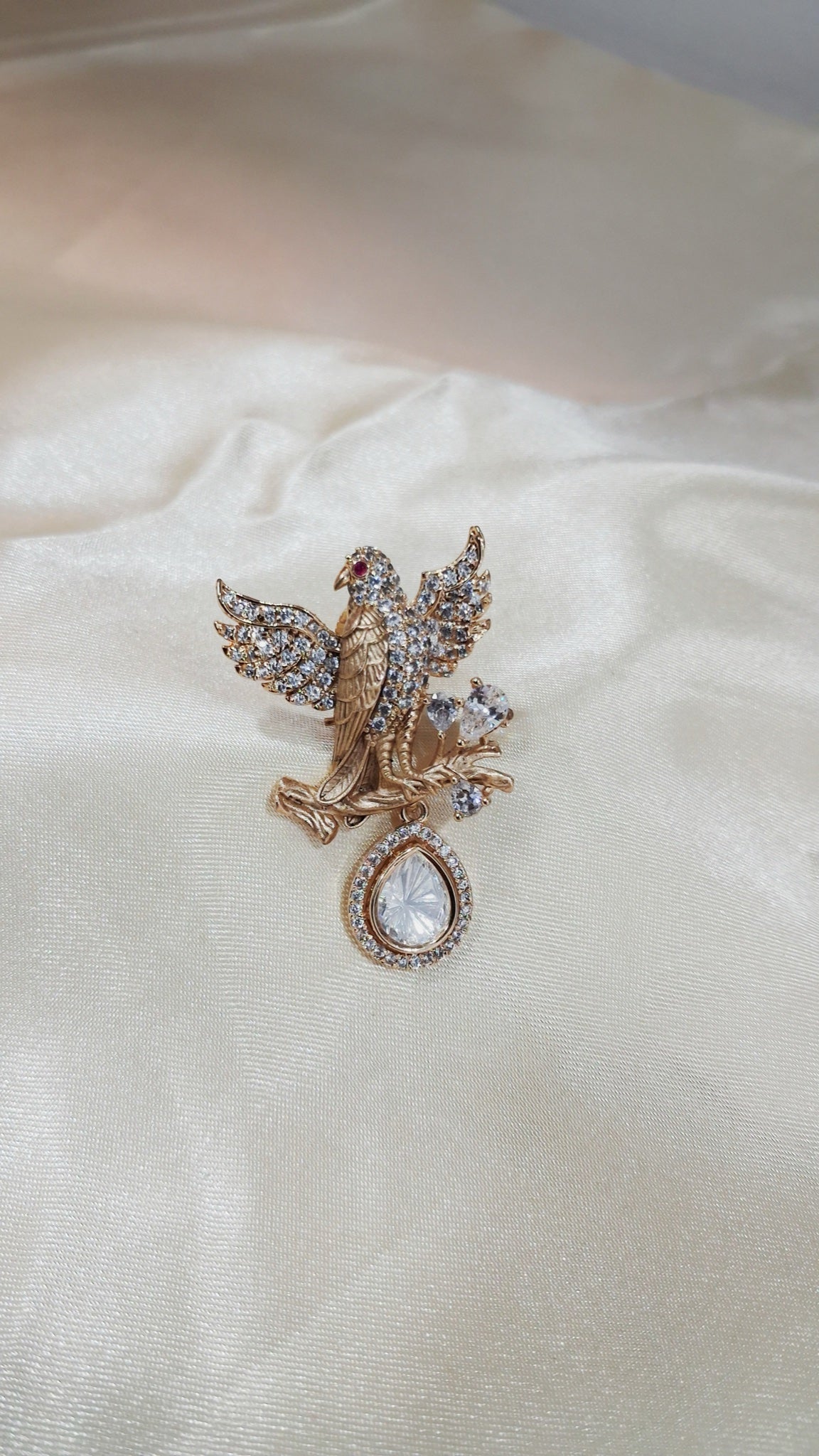 Gold-tone eagle earrings with crystal wings and polki-look drop - view 2