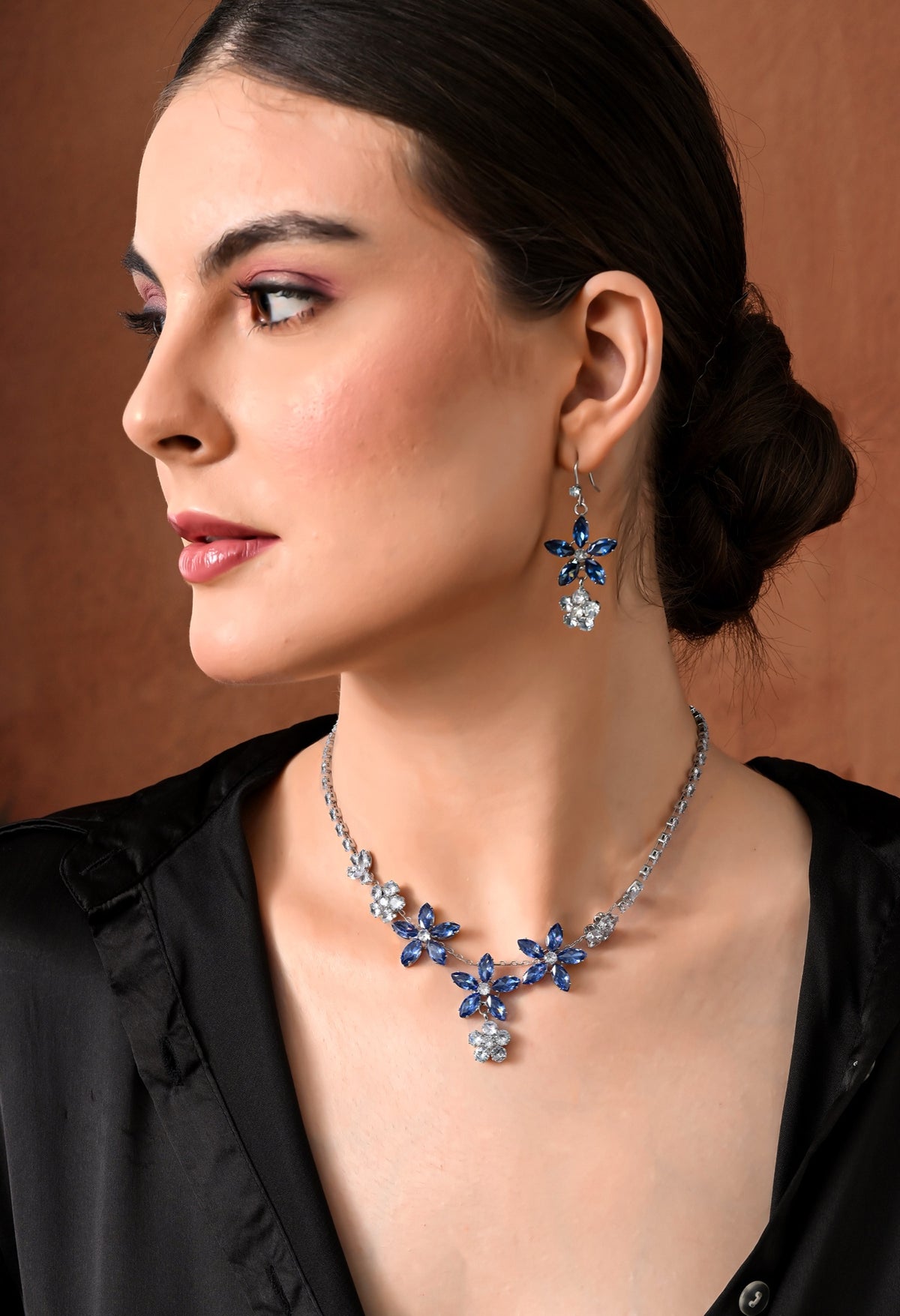 Silver-tone necklace set with blue crystal starflowers and clear crystal blossoms - view 2