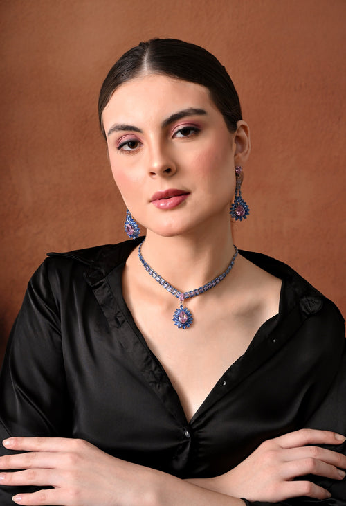 Silver-tone blue crystal collar necklace set with pink teardrop halo pendant