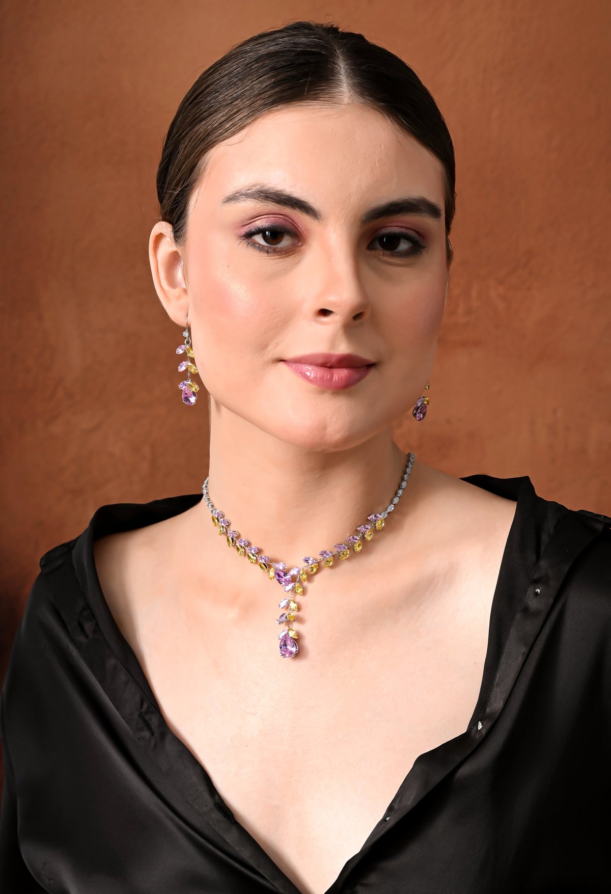 Silver-tone necklace set with pink and yellow crystal vine