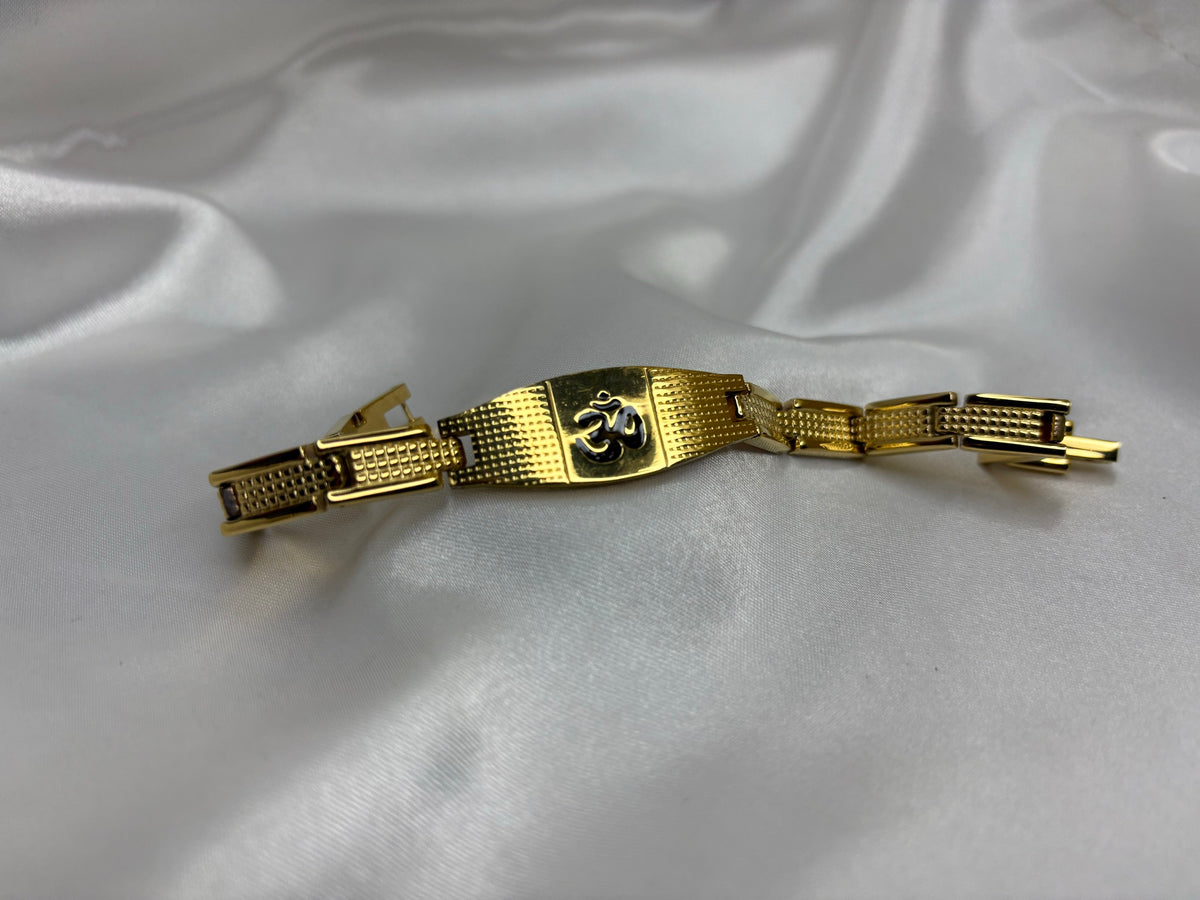 Gold-tone textured link bracelet with curved Om plaque