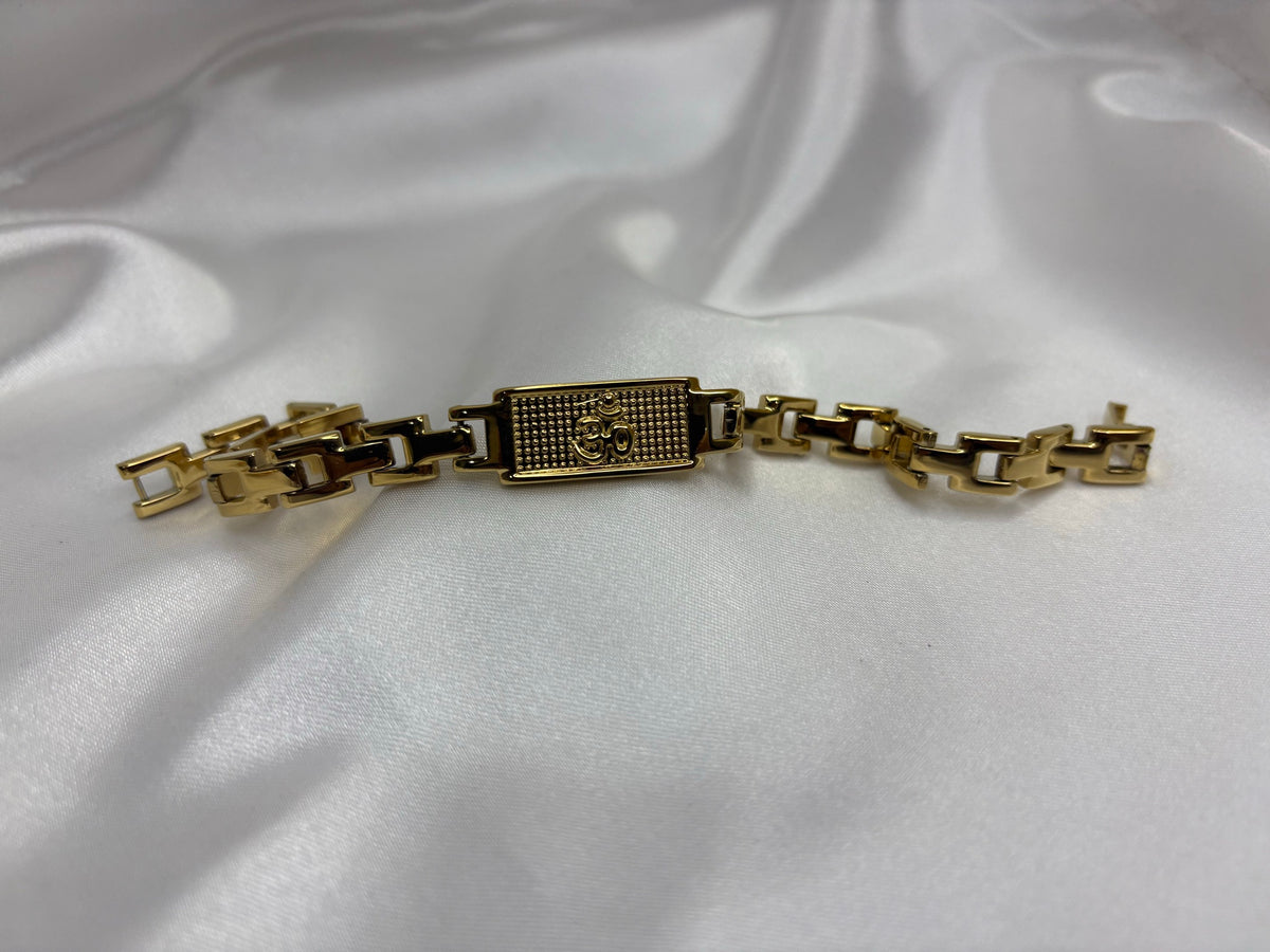 Gold-tone slim link bracelet with petite Om plaque