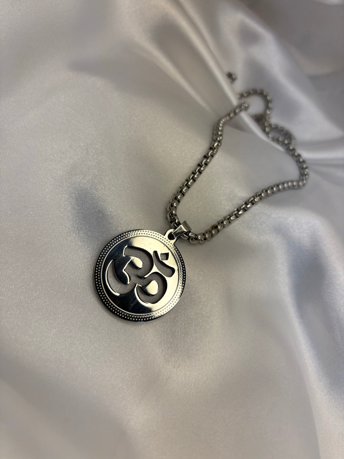 Silver-tone Om cut-out medallion pendant on box chain