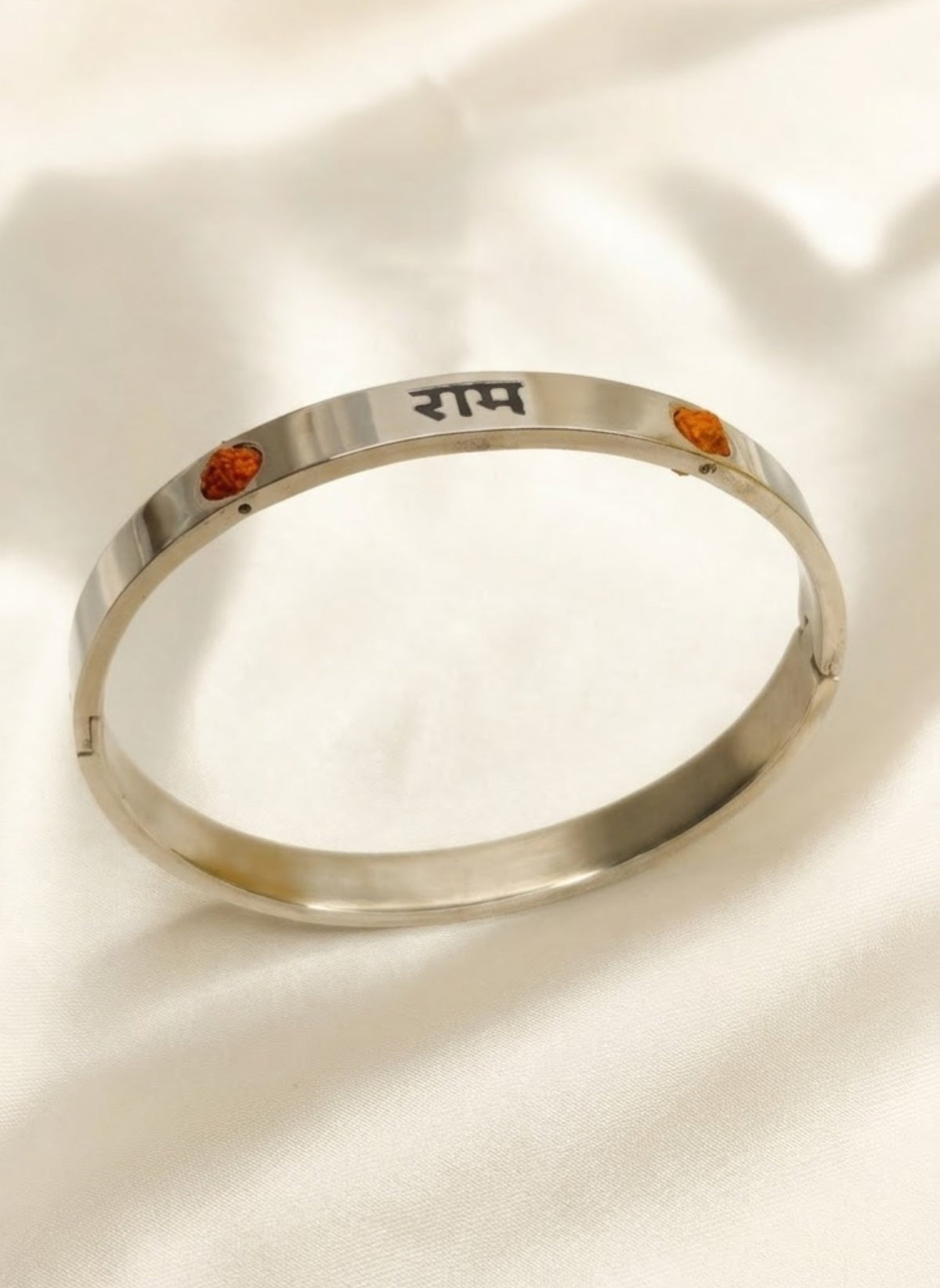 Polished kada bracelet with black Devanagari Ram name between two rudraksha beads